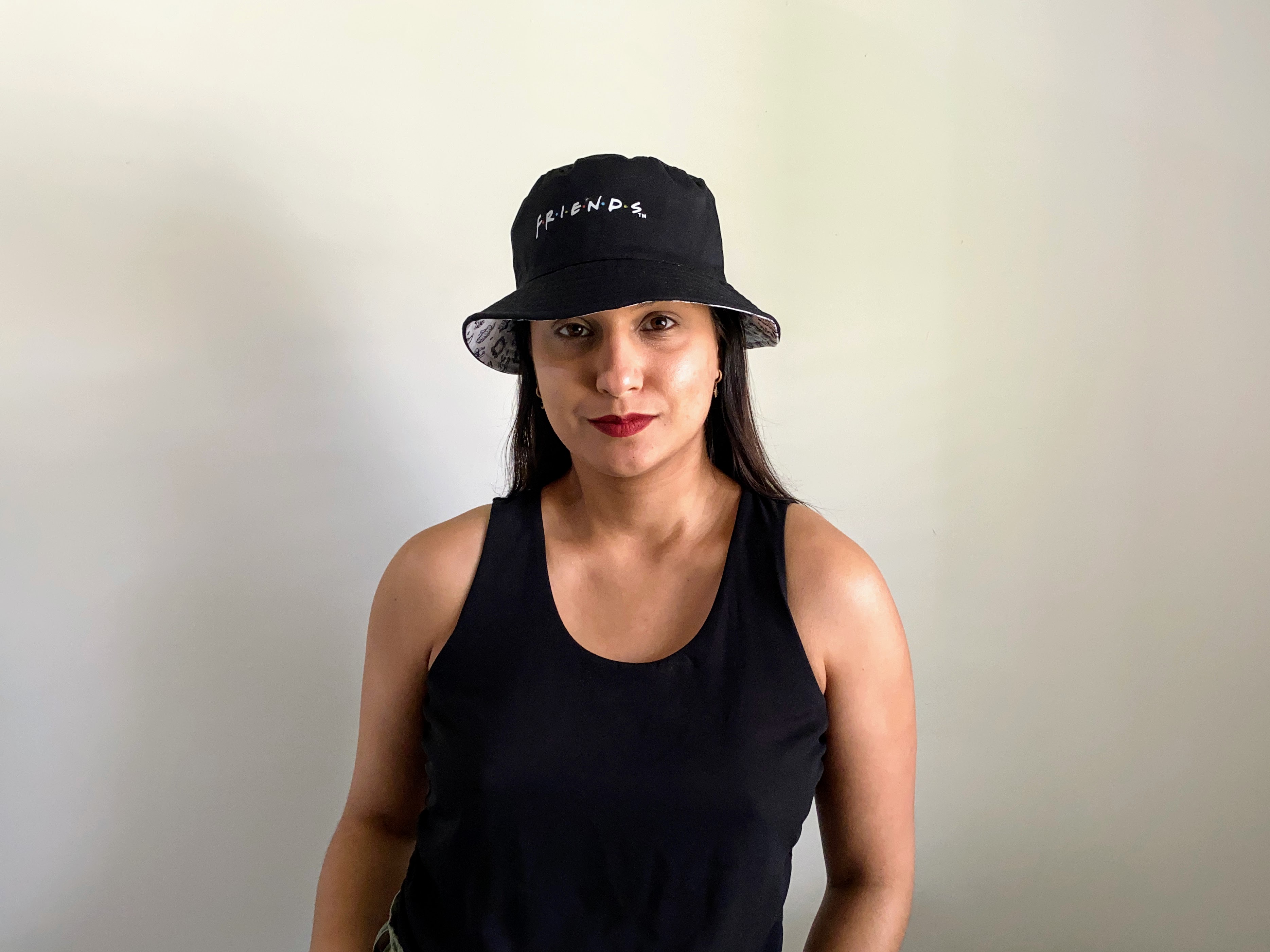 woman wearing a black bucket hat