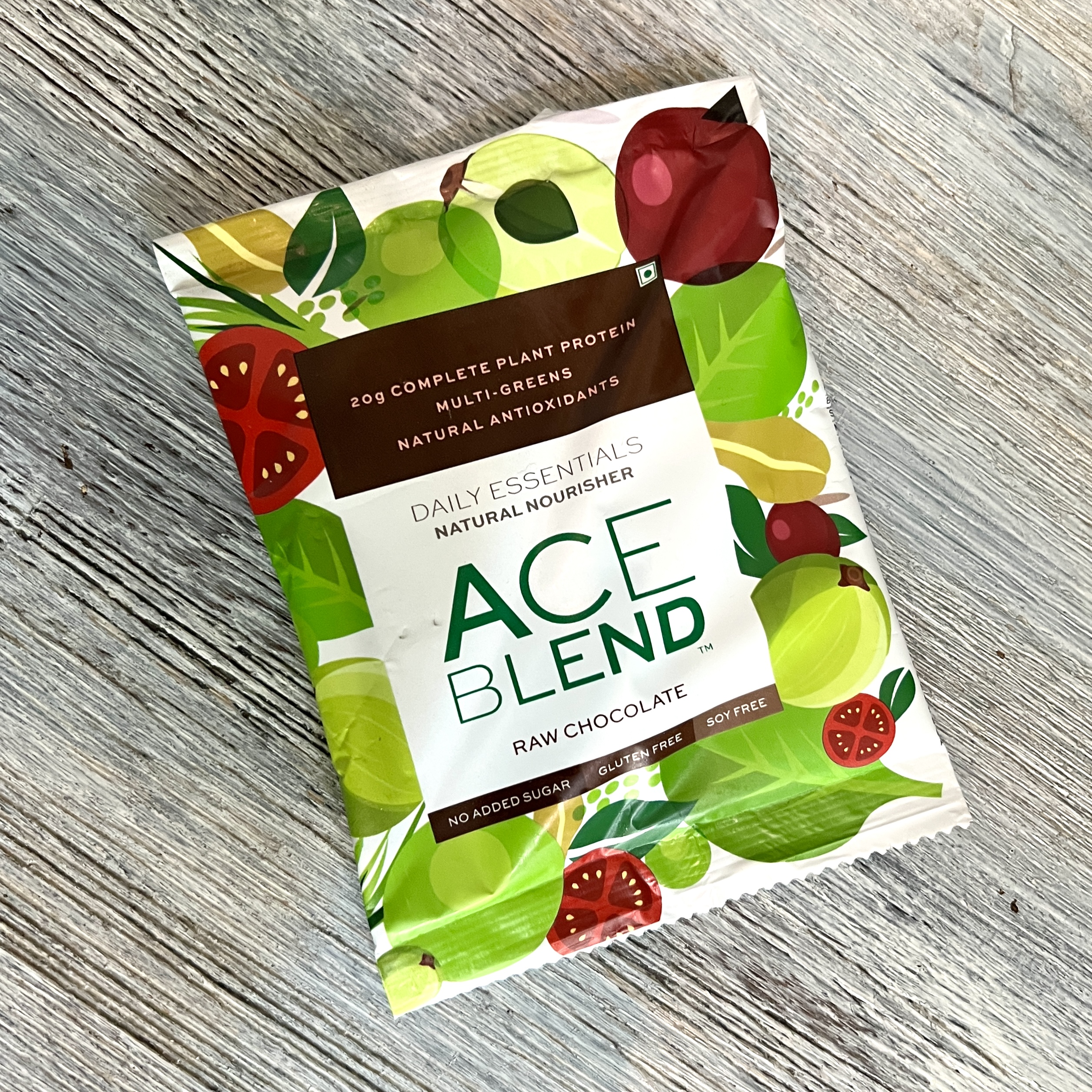 Front of Ace Blend Raw Chocolate Protein for Bombay and Cedar Lifestyle April 2022