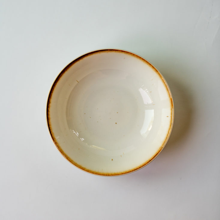 white salad bowl with gold trim