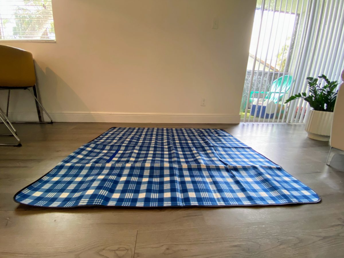 open blanket on the floor