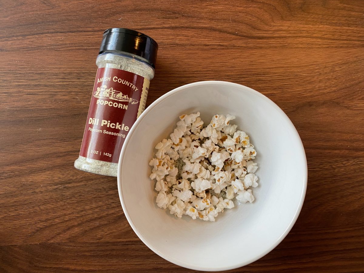 dill pickle popcorn seasoning with popcorn plate