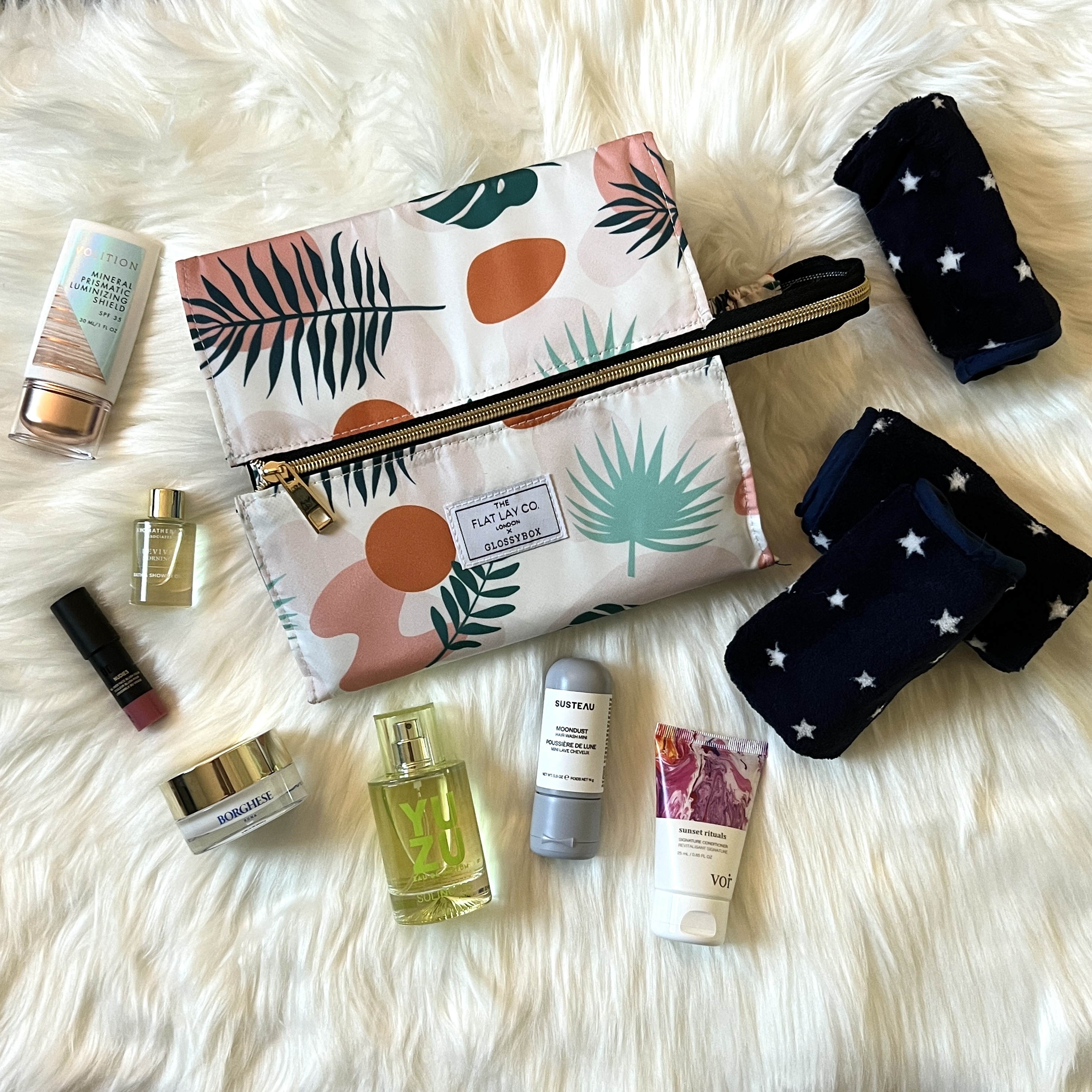 https://blog.mysubscriptionaddiction.com/wp-content/uploads/2022/07/27/GlossyBox-x-Flat-Lay-Co.-Limited-Edition-Full-Contents.jpg