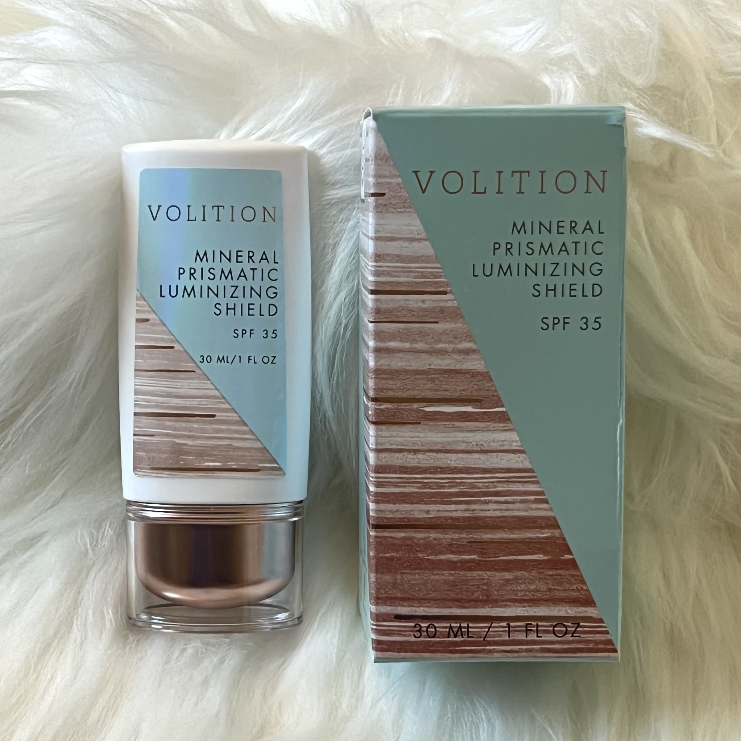 Front of Volition Sunscreen for GlossyBox x Flat Lay Co. Limited Edition