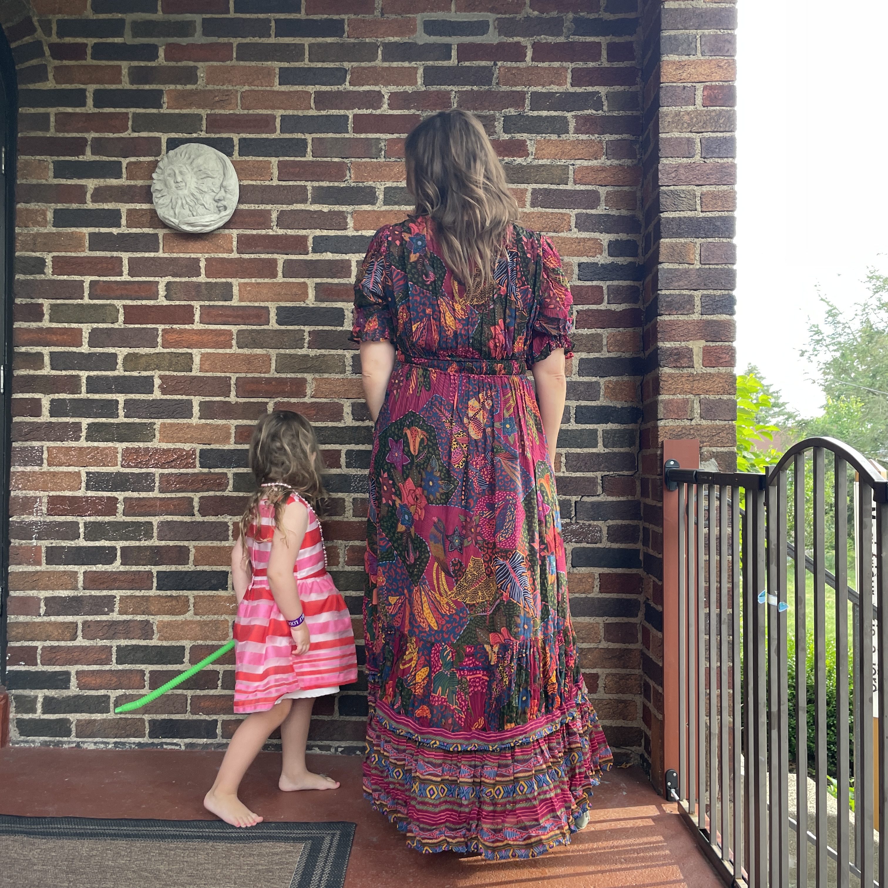 reviewer wearing jewel toned nuuly dress