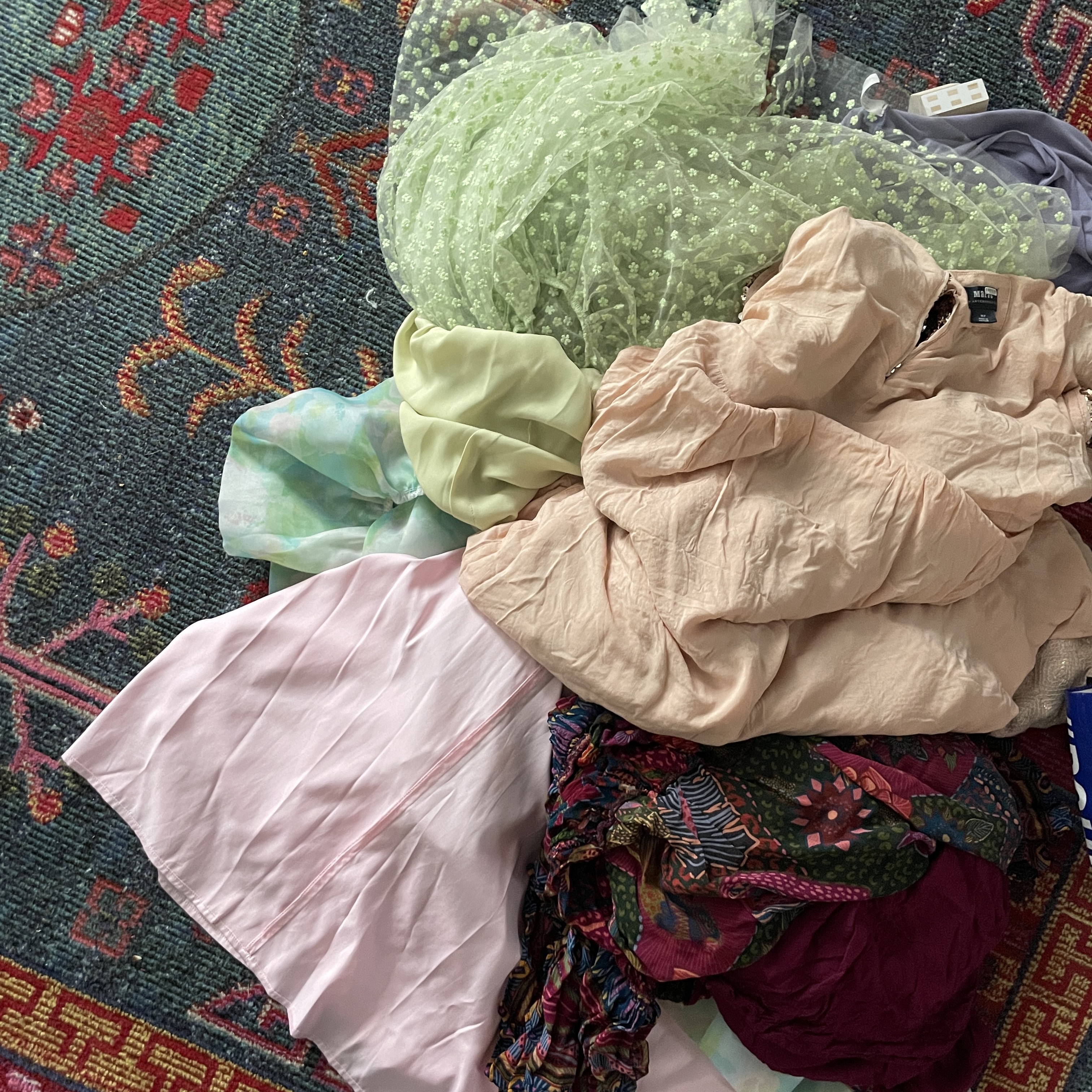 clothes in a pile on the floor