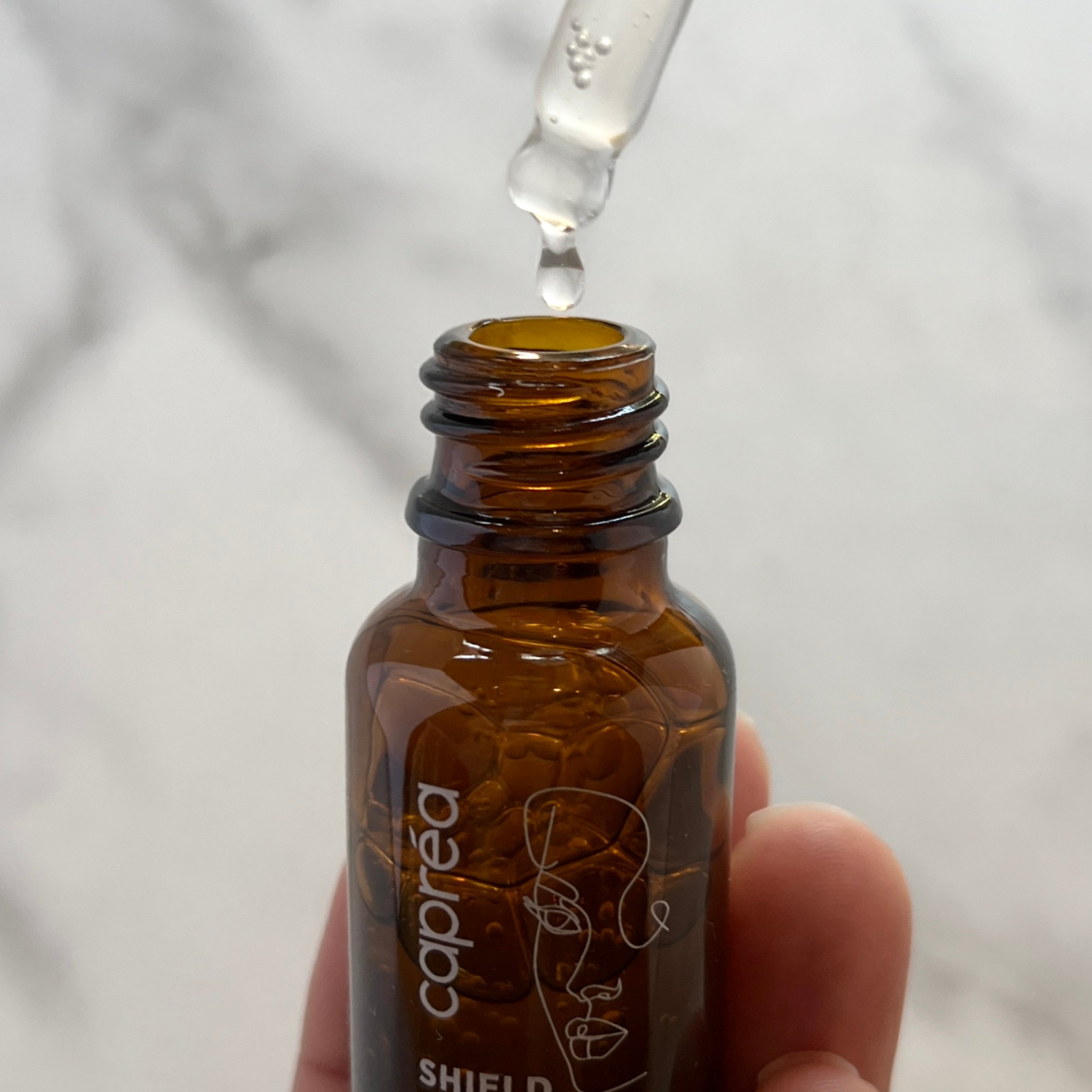 Closeup of Caprea Shield Serum for Nourish Beauty Box September 2022