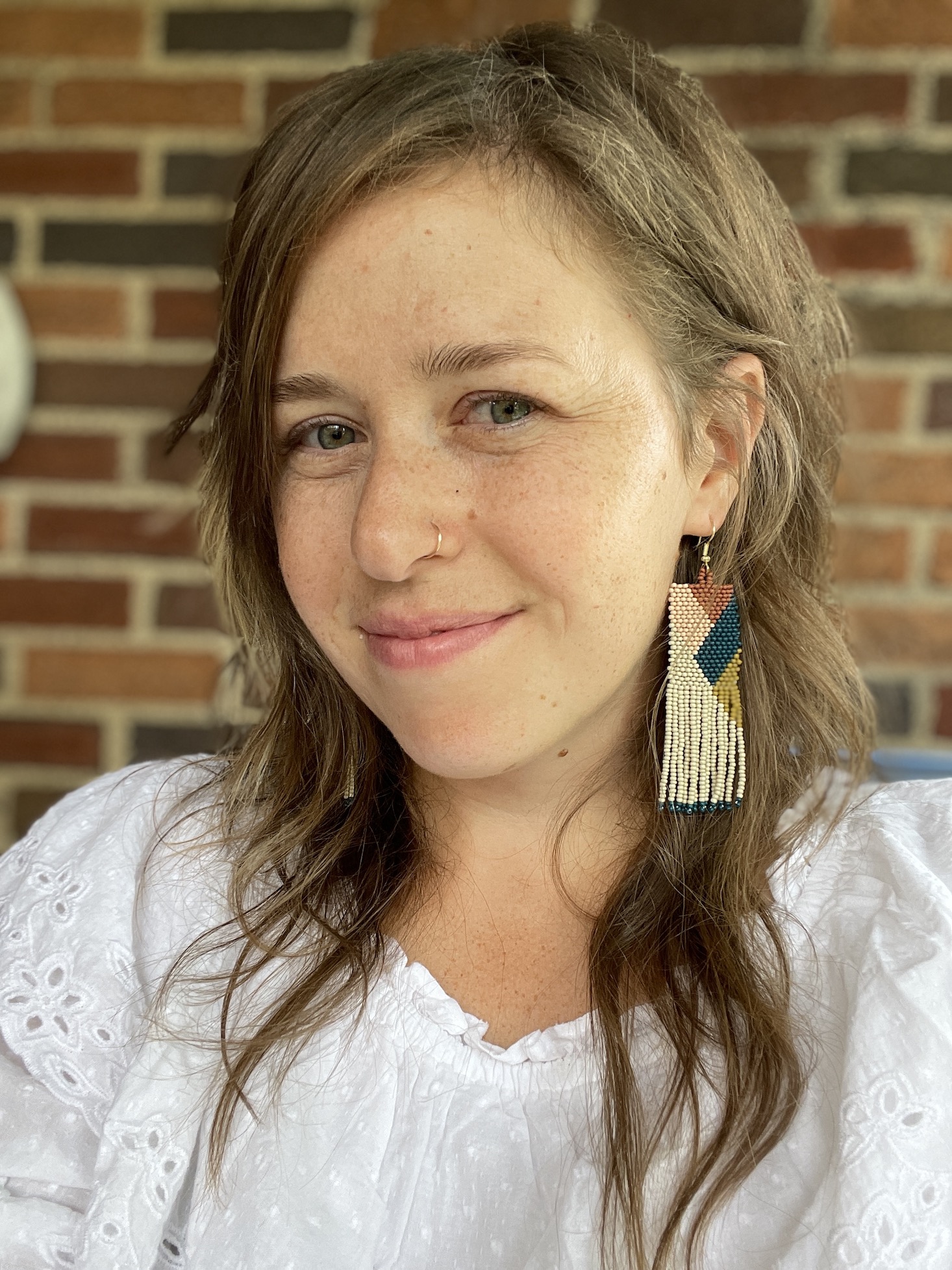 INK+ALLOY Insider Subscription seed bead earrings on the reviewer