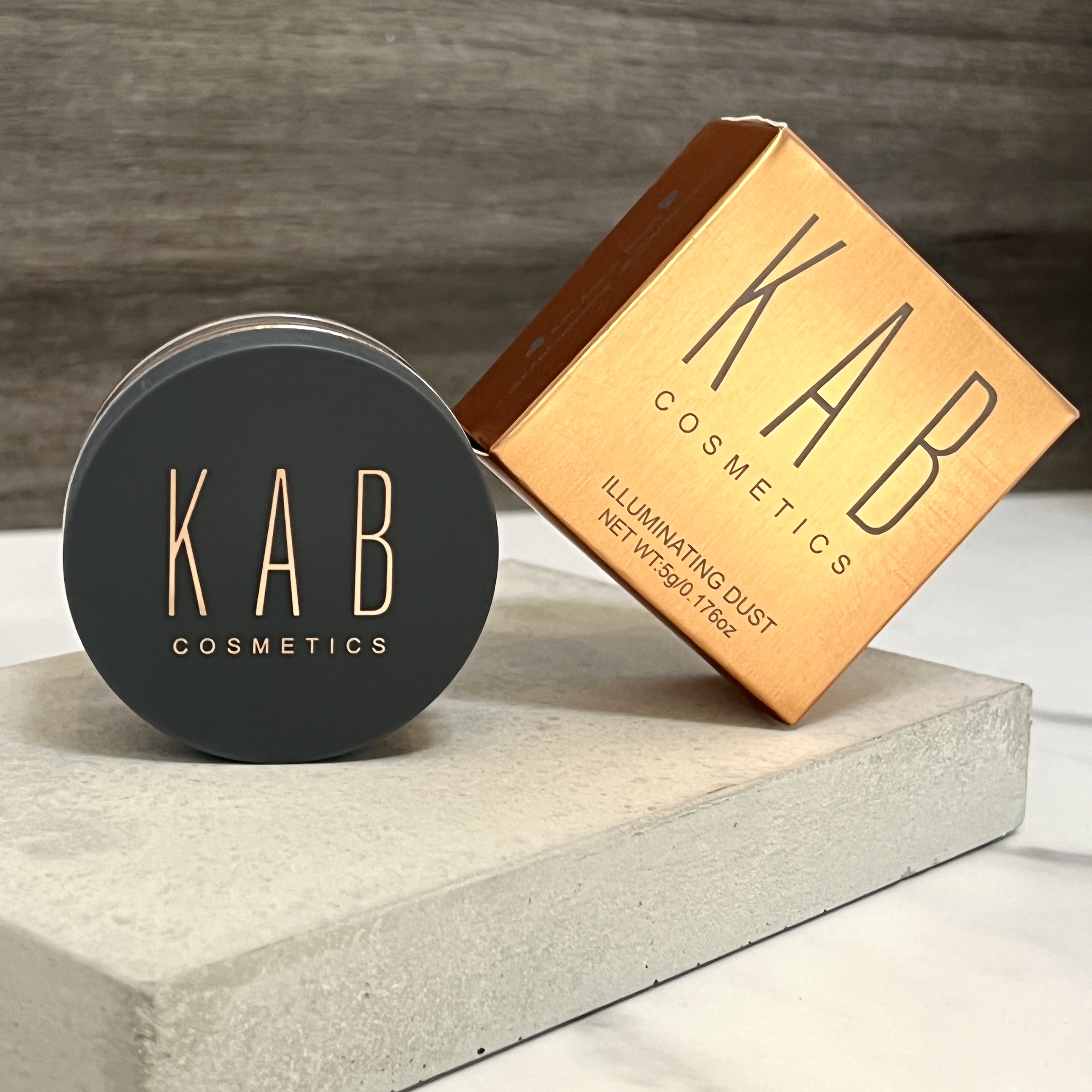 Front of KAB Cosmetics Illuminating Dust for GlossyBox September 2022