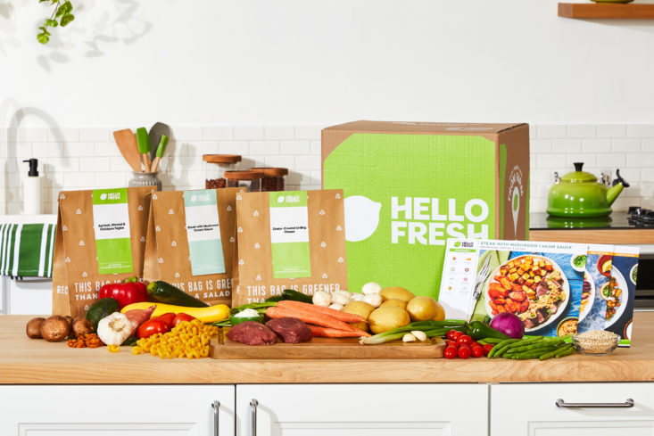 HelloFresh ingredients and meal kits on kitchen counter