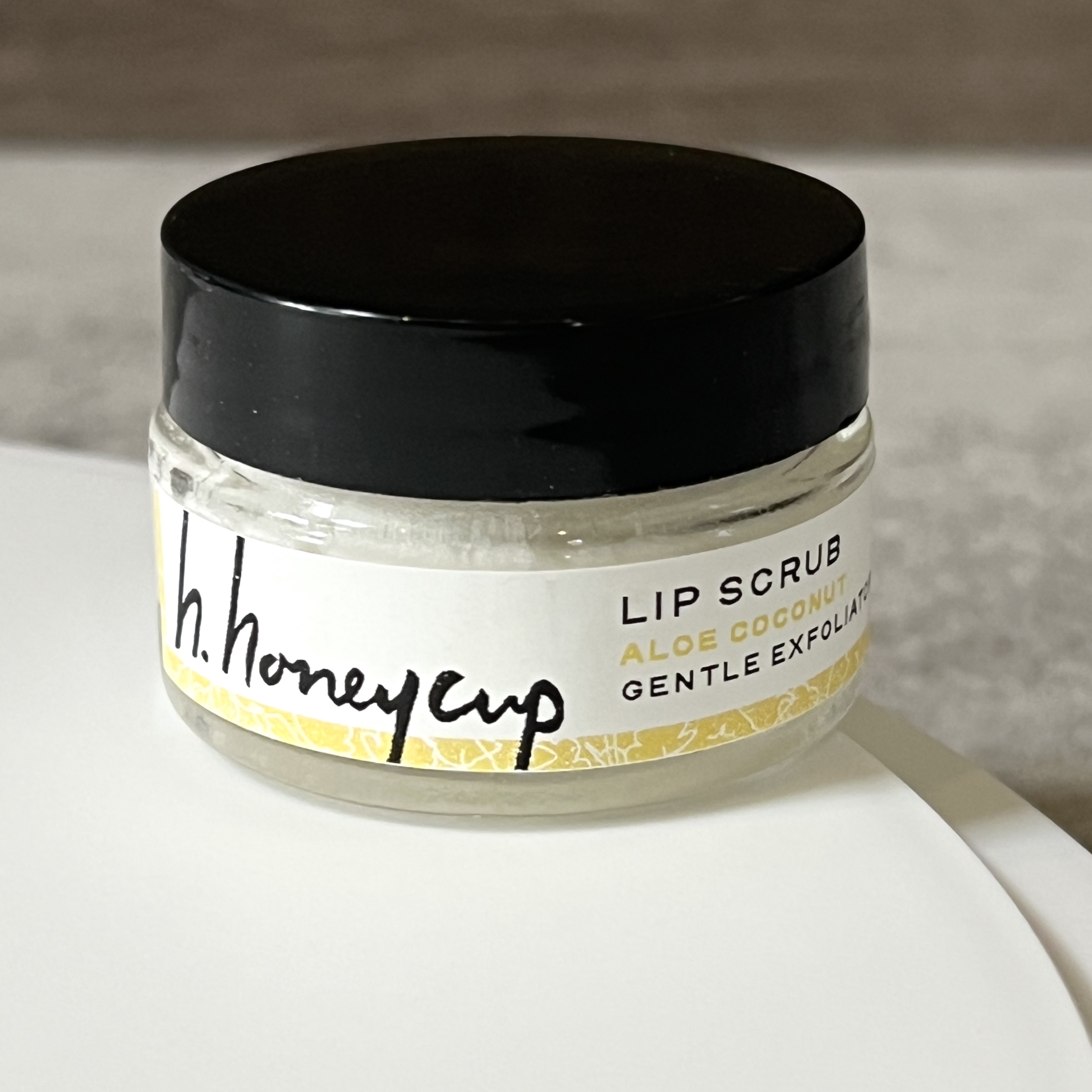 Front of H. Honeycup Lip Scrub for Nourish Beauty Box January 2023