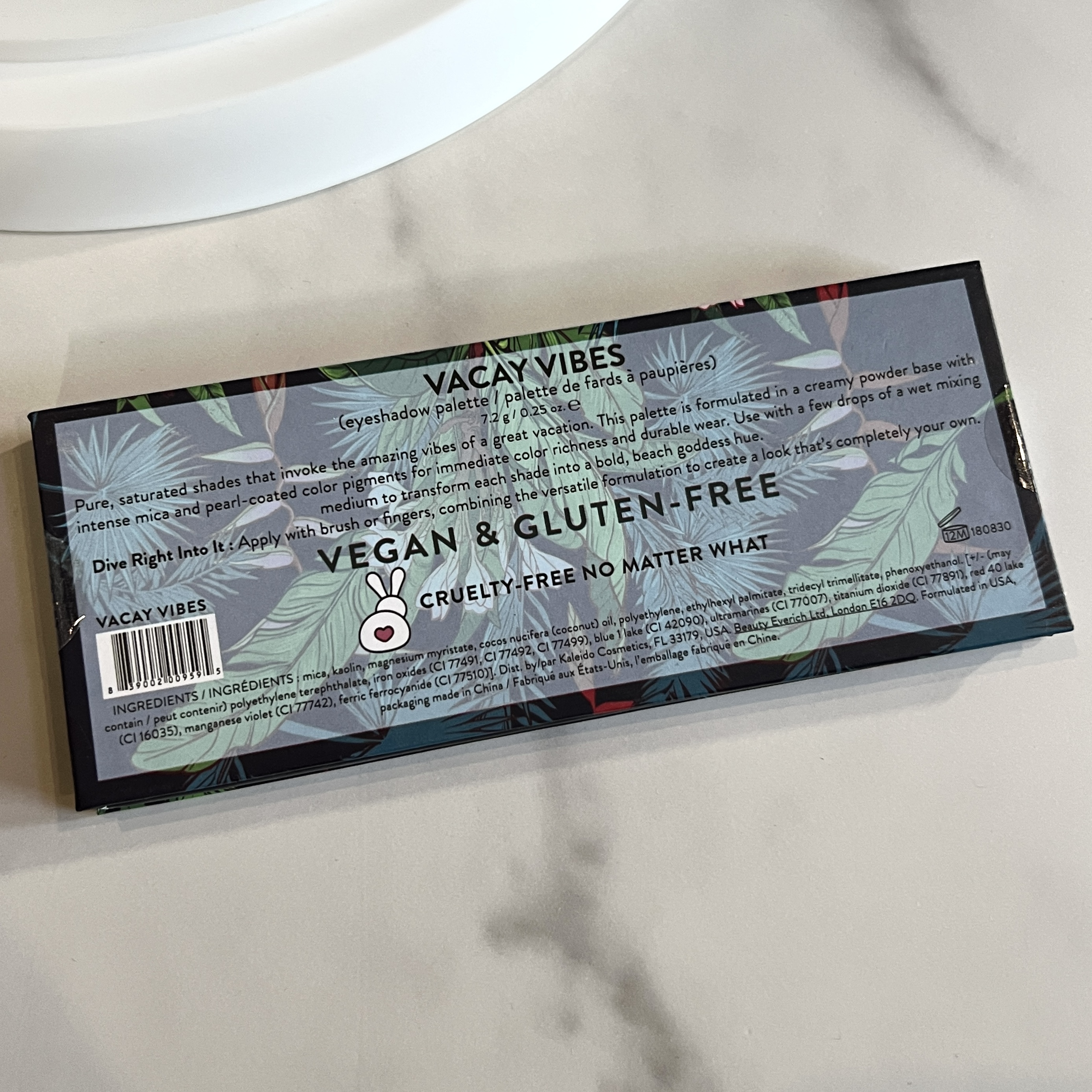 Back of Kaleido Cosmetics Vacay Vibes Eyeshadow Palette for Nourish Beauty Box March 2023