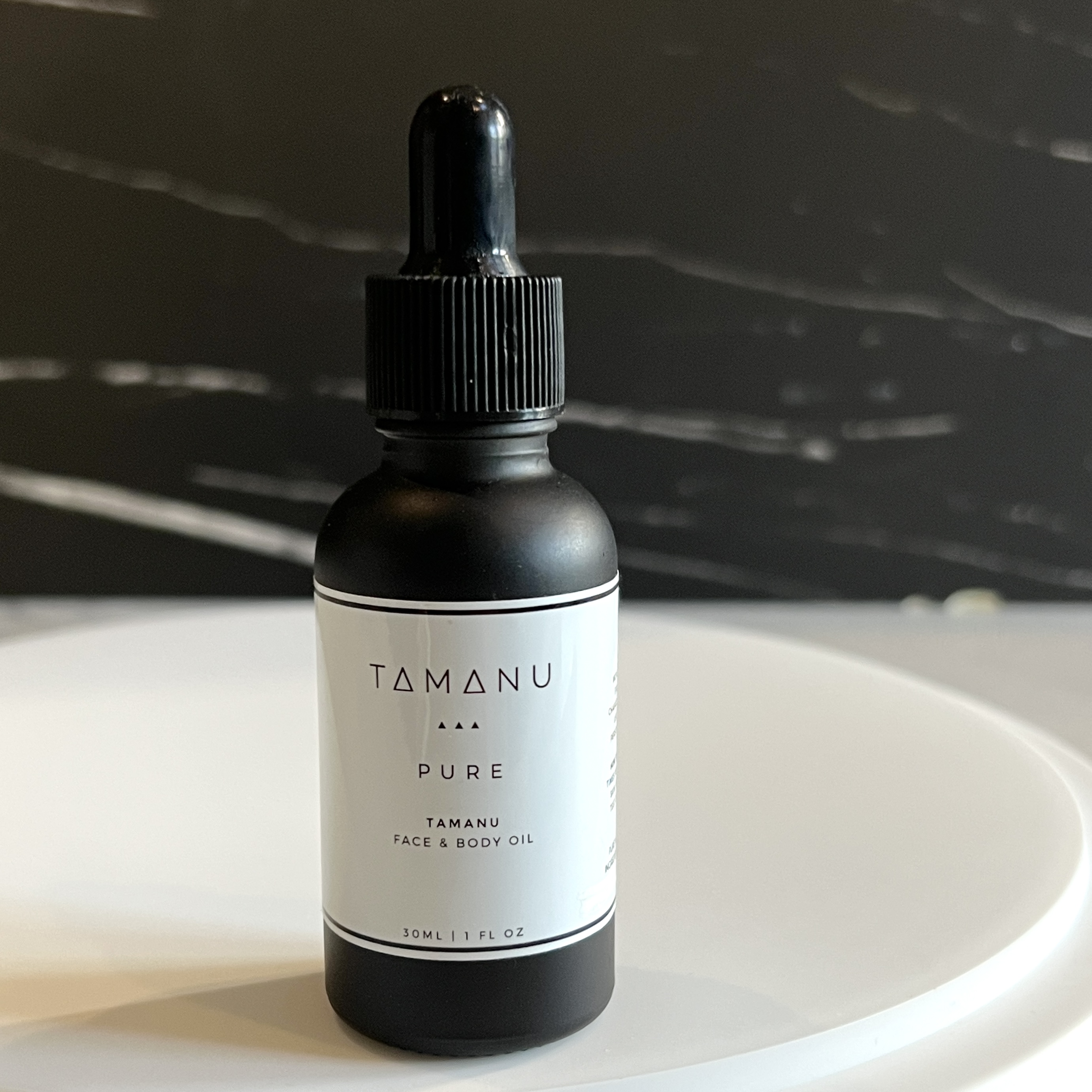 Front of Tamanu Pure Face and Body Oil for Nourish Beauty Box March 2023