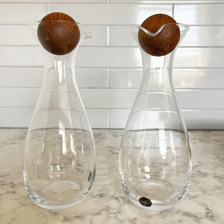 oil and vinegar bottles sit on a countertop