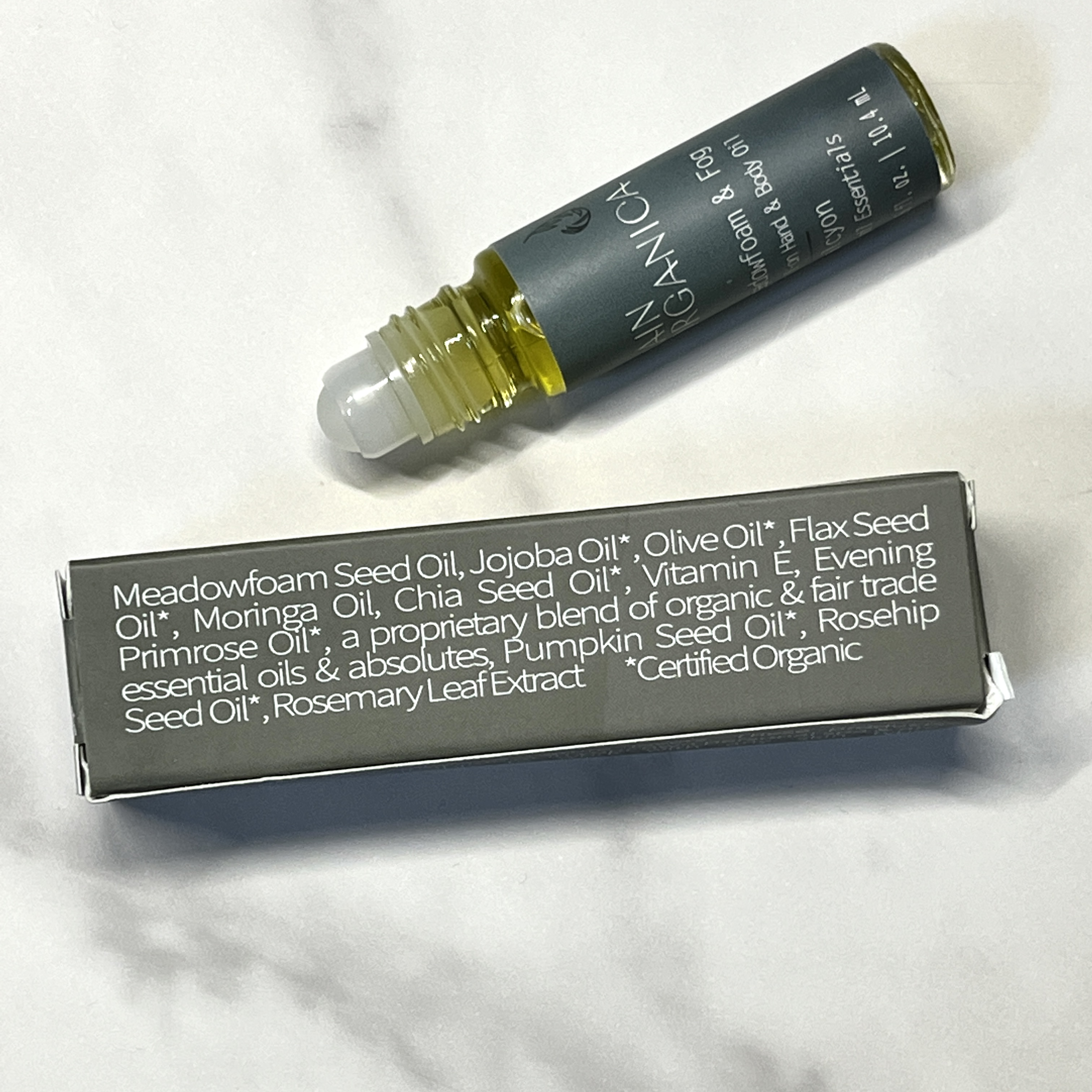 Back of Rain Organica Rollerball for Nourish Beauty Box April 2023