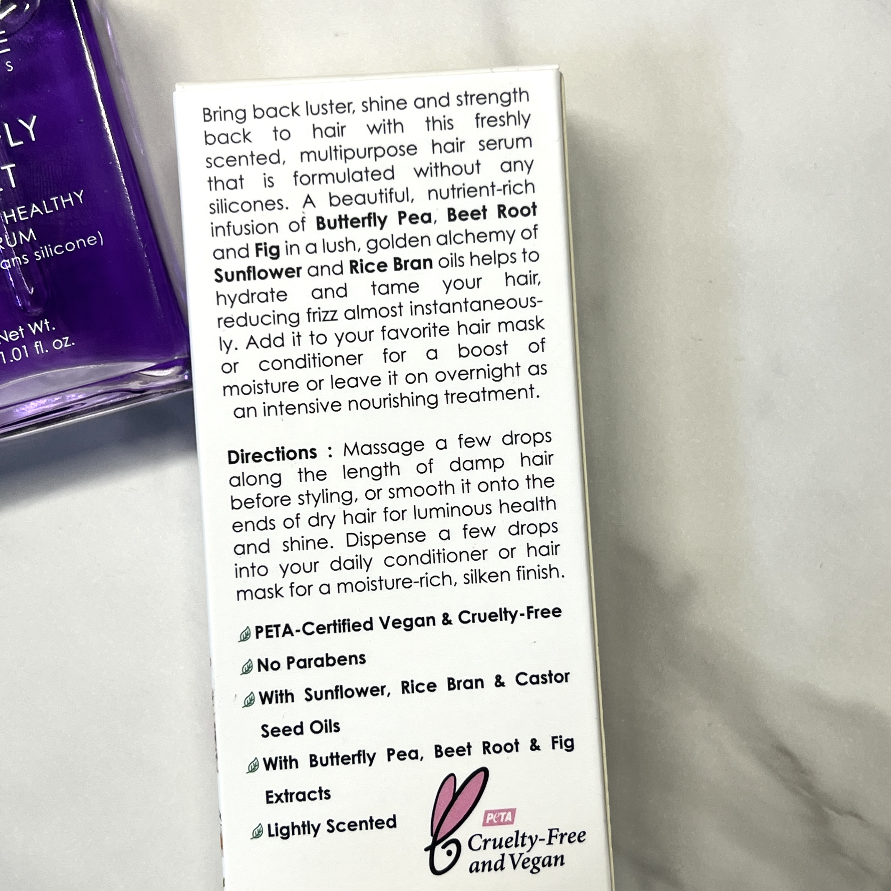 Back of Seraphine Botanicals Hair Serum for Nourish Beauty Box April 2023