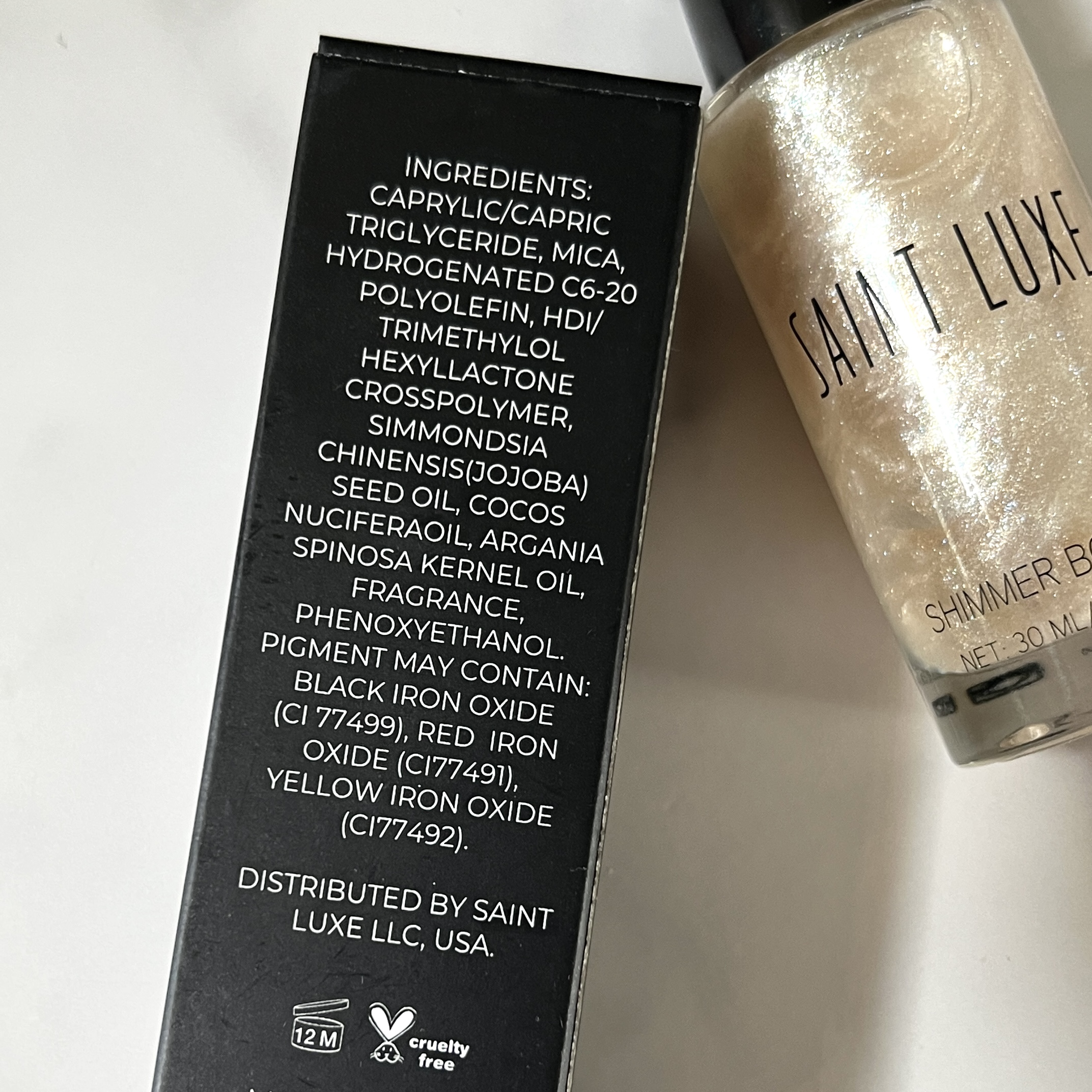 Back of Saint Luxe Beauty Shimmer Body Oil for Cocotique Makeup Lover