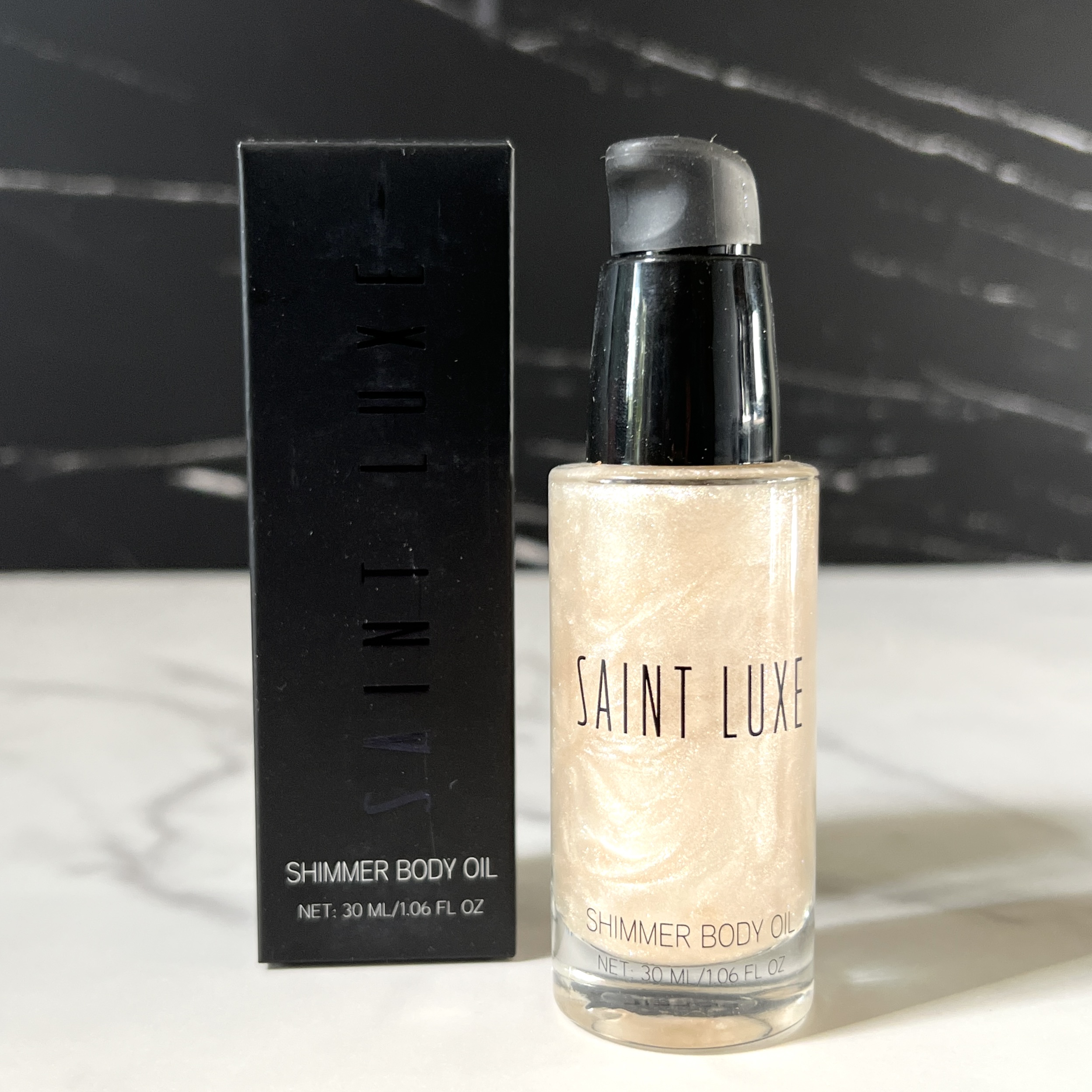 Front of Saint Luxe Beauty Shimmer Body Oil for Cocotique Makeup Lover