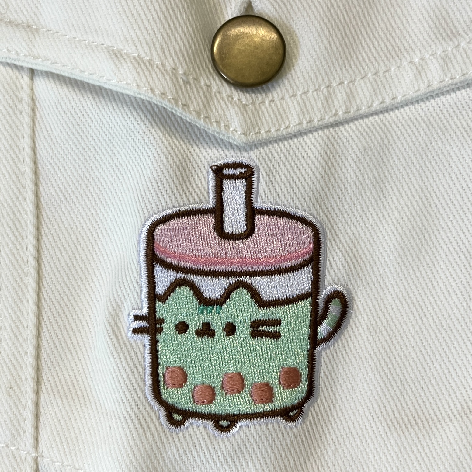 Closeup of Emblem on Denim Jacket for Pusheen Box Spring 2023