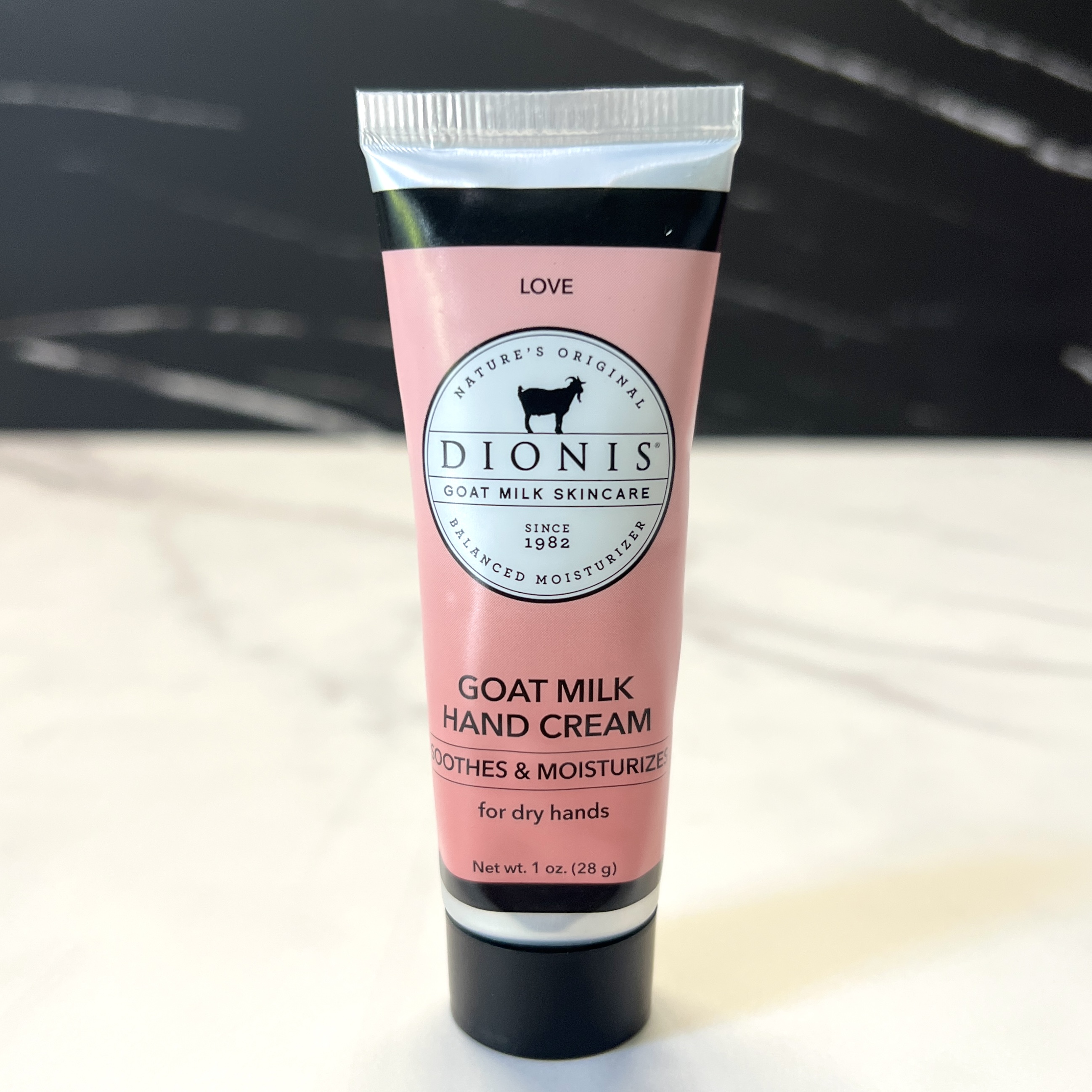 Front of Dionis Goat Milk Hand Cream for Ipsy Glam Bag May 2023