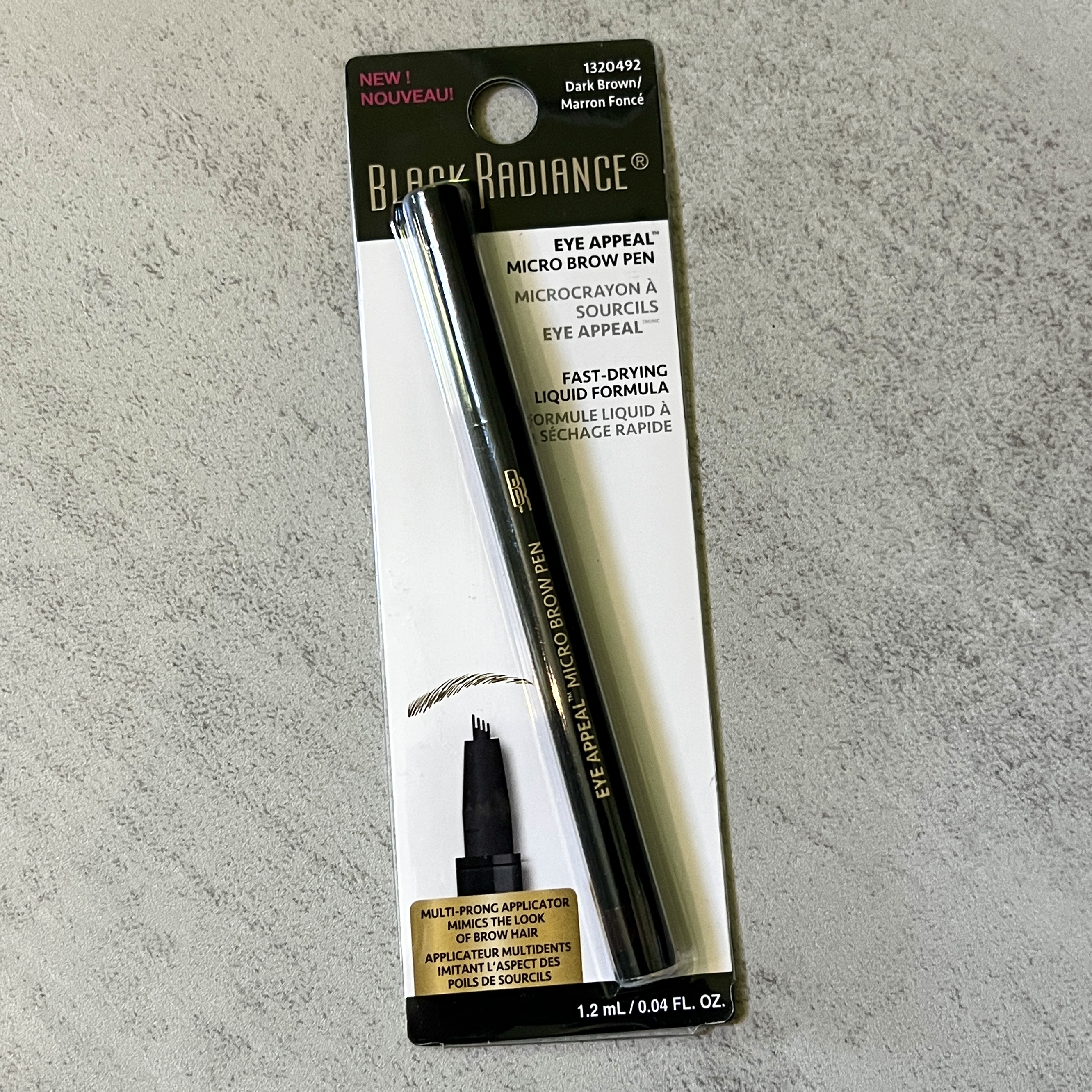 Front of Black Radiance Micro Brow Pen for Cocotique June 2023