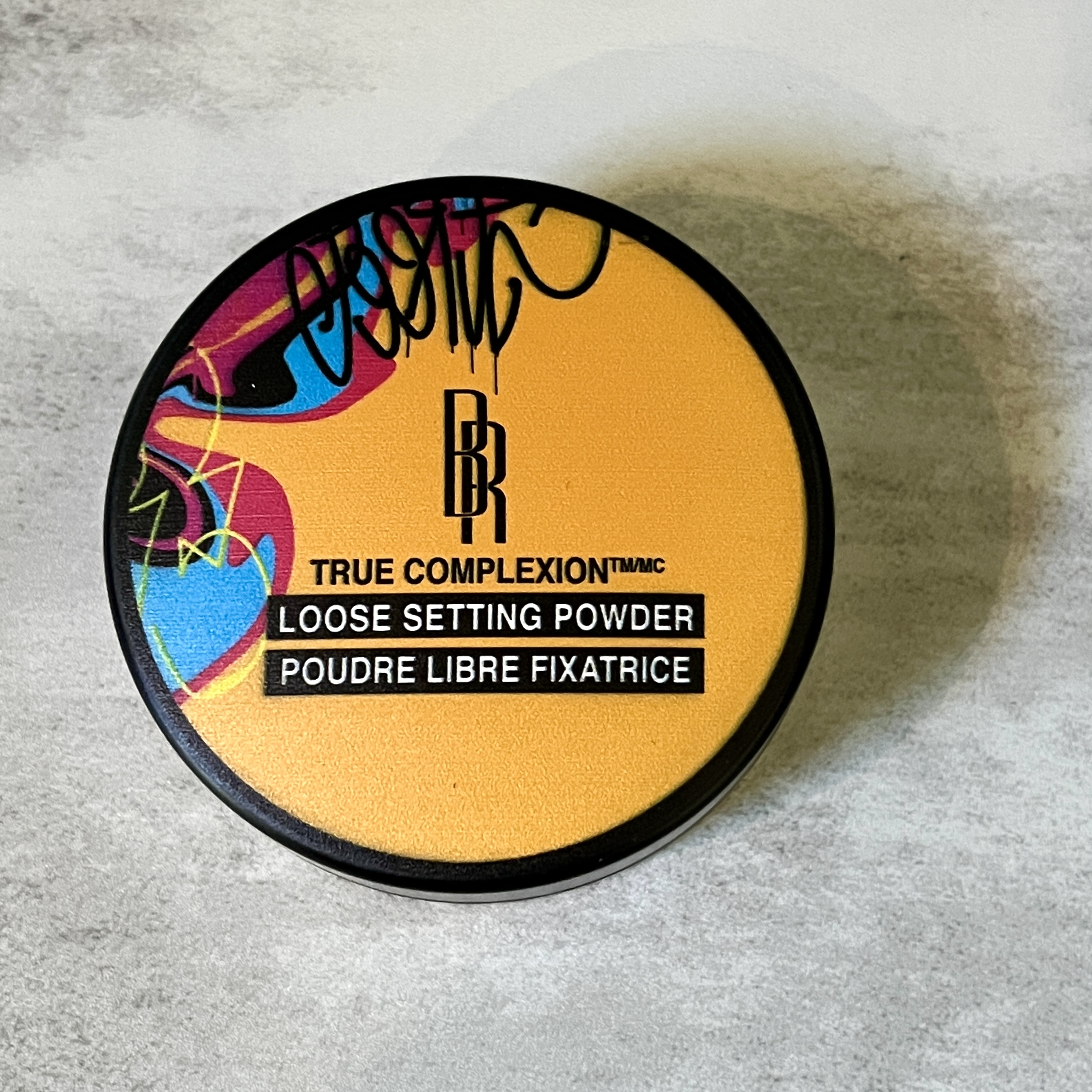 Front of Black Radiance Setting Powder for Cocotique June 2023