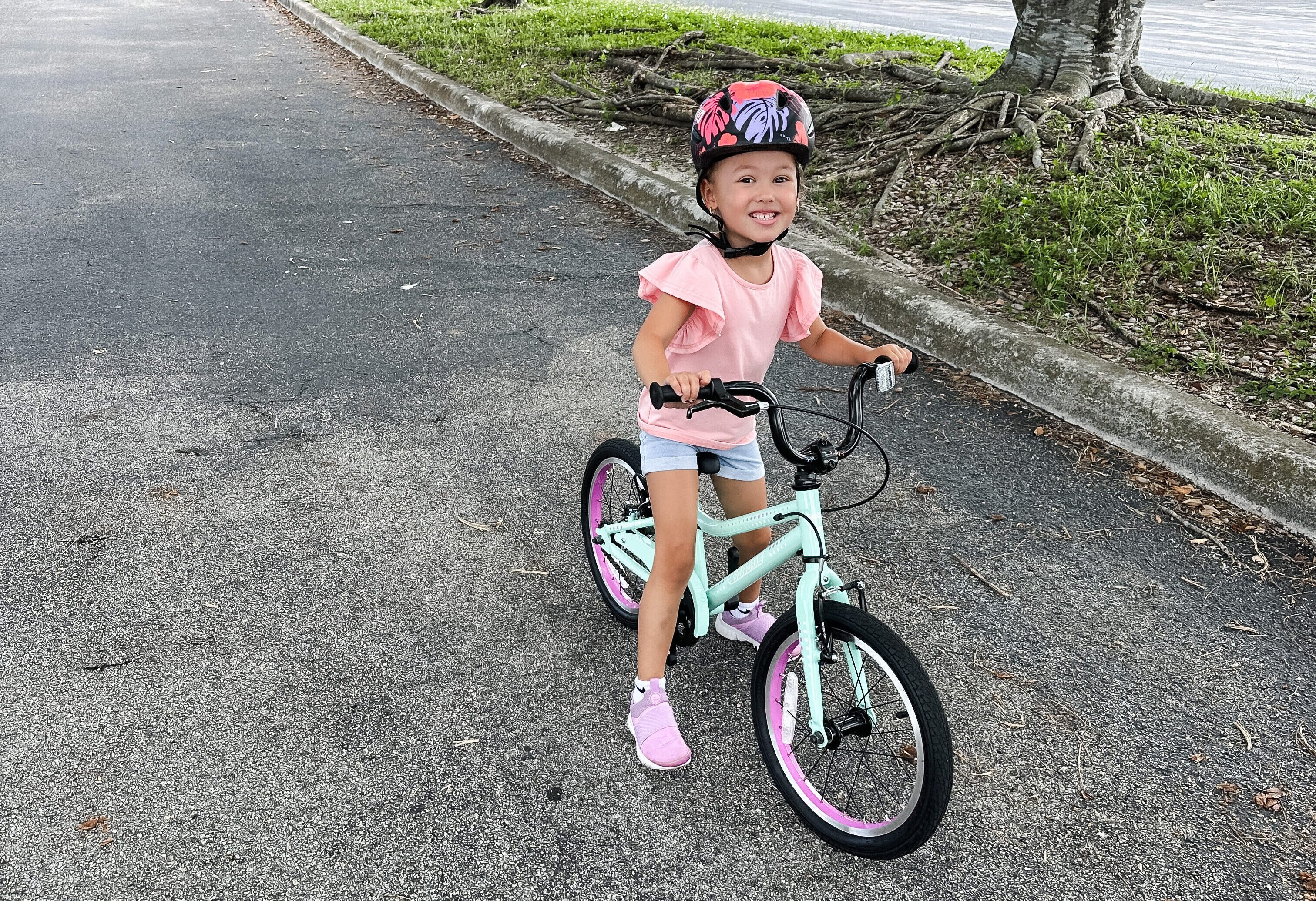 Learning to ride a deals bike without training wheels