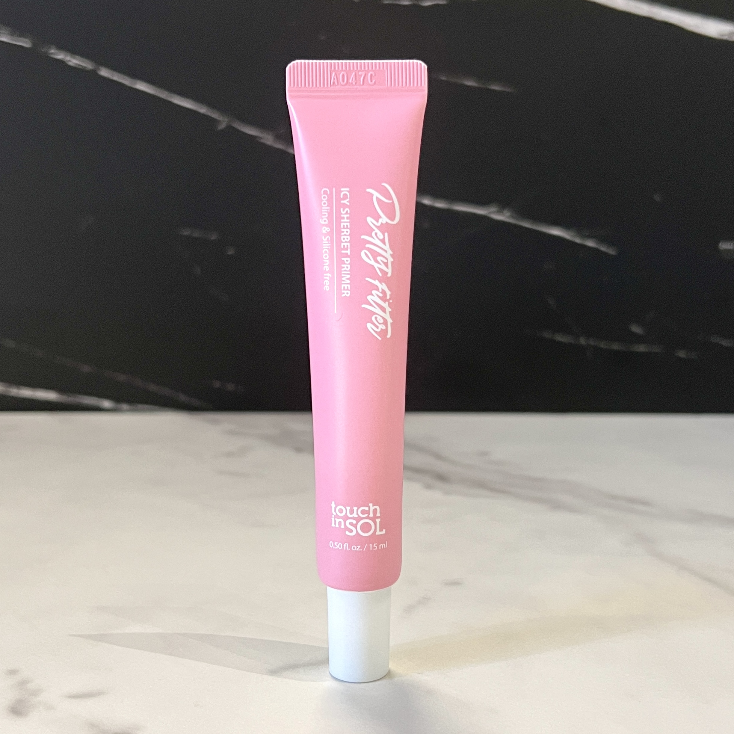 Front of Touch in Sol Primer for Ipsy Glam Bag July 2023