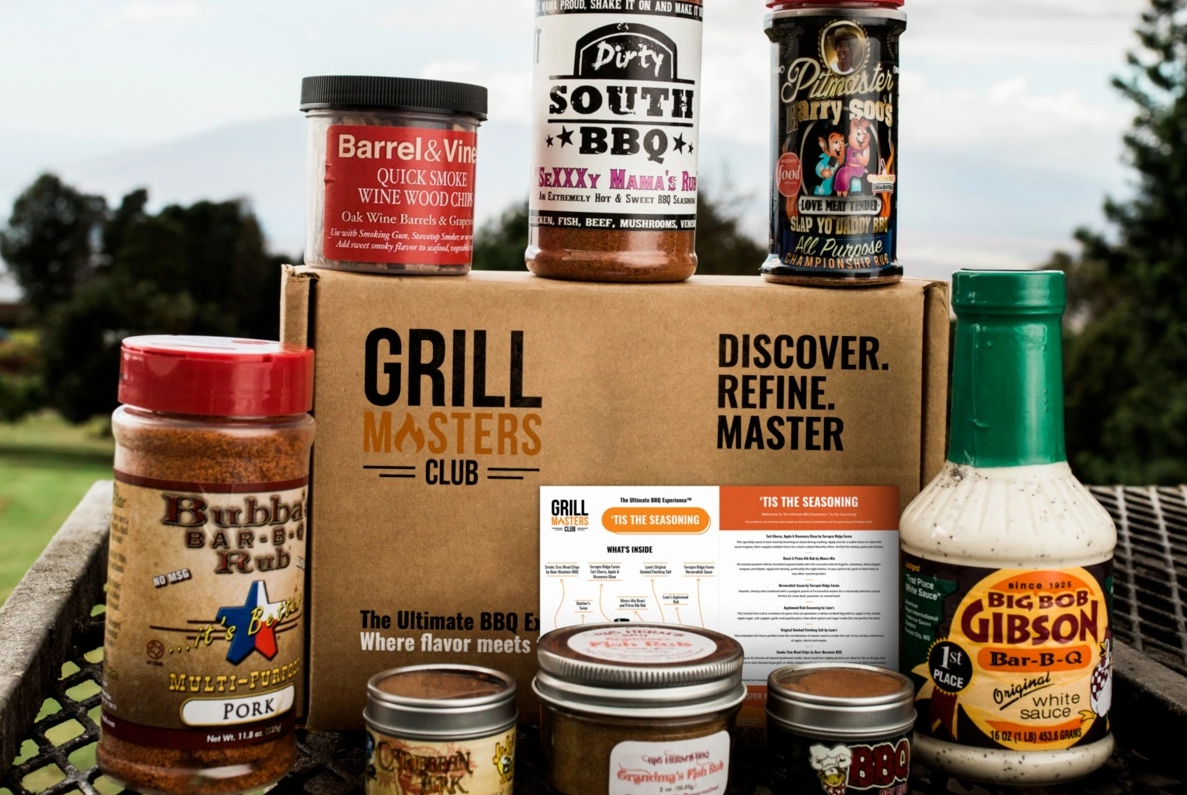 bbq rubs and sauces next to a box