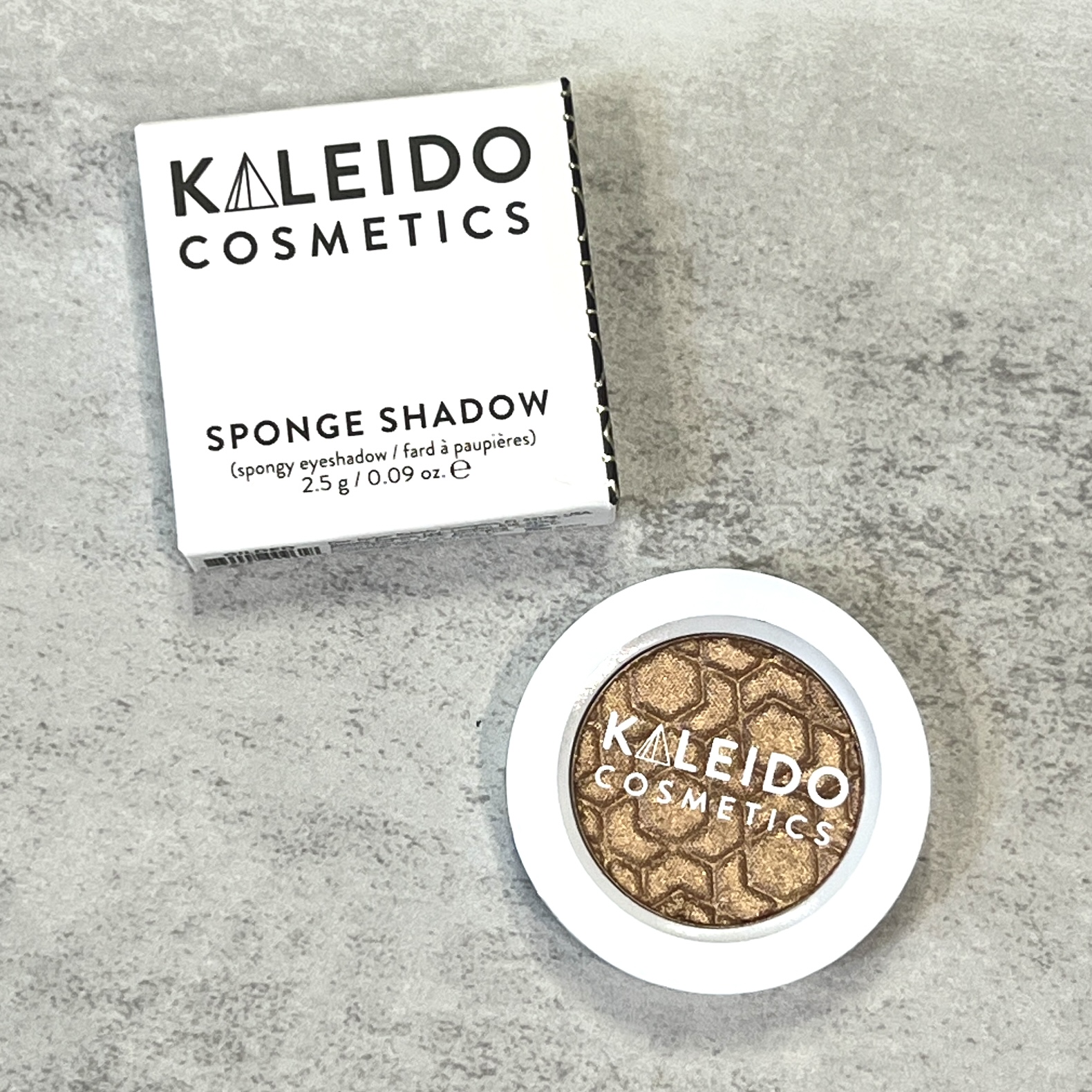 Front of Kaleido Cosmetics Sponge Shadow in Gilded for Nourish Beauty Box December 2023