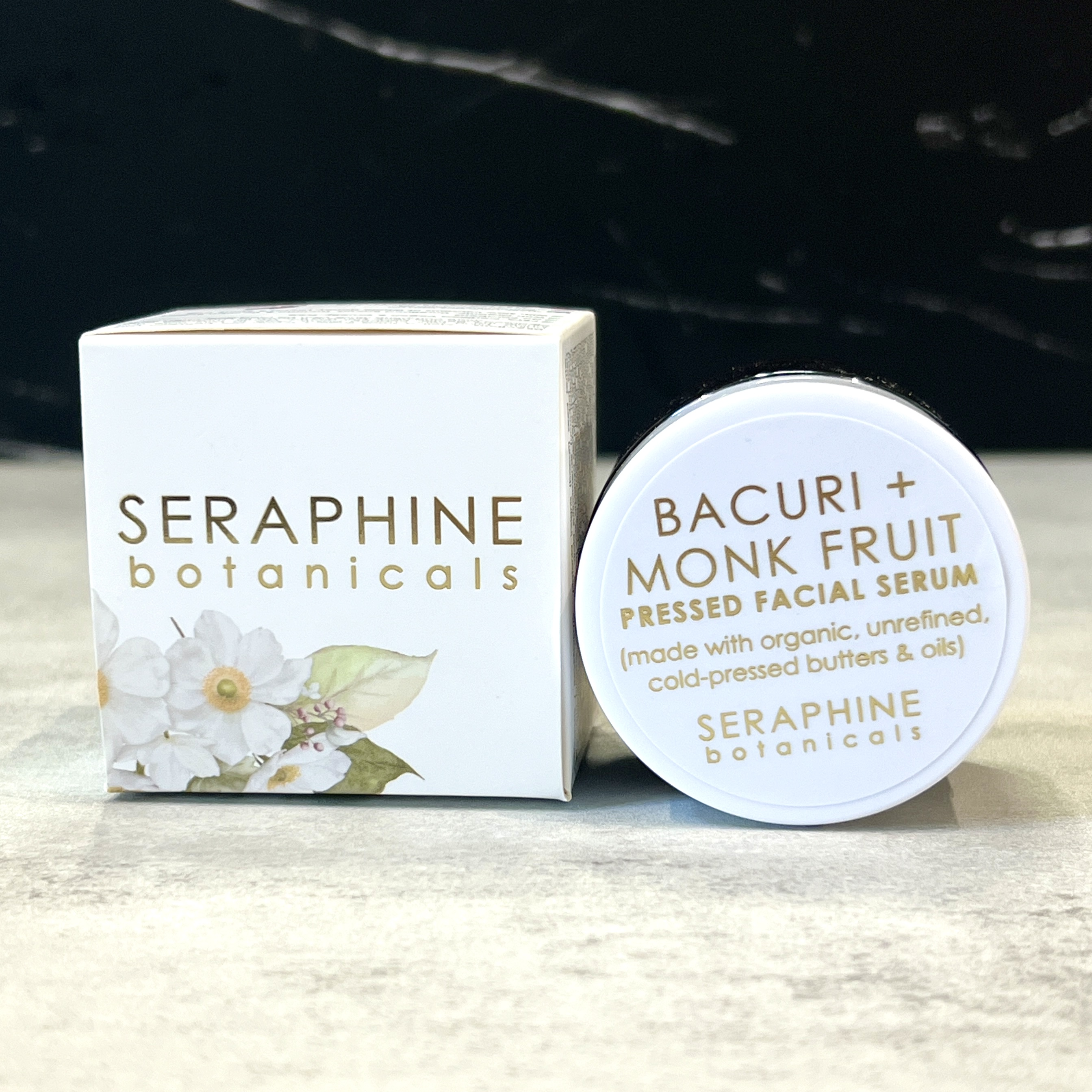 Front of Seraphine Botanicals Pressed Facial Serum for Nourish Beauty Box December 2023