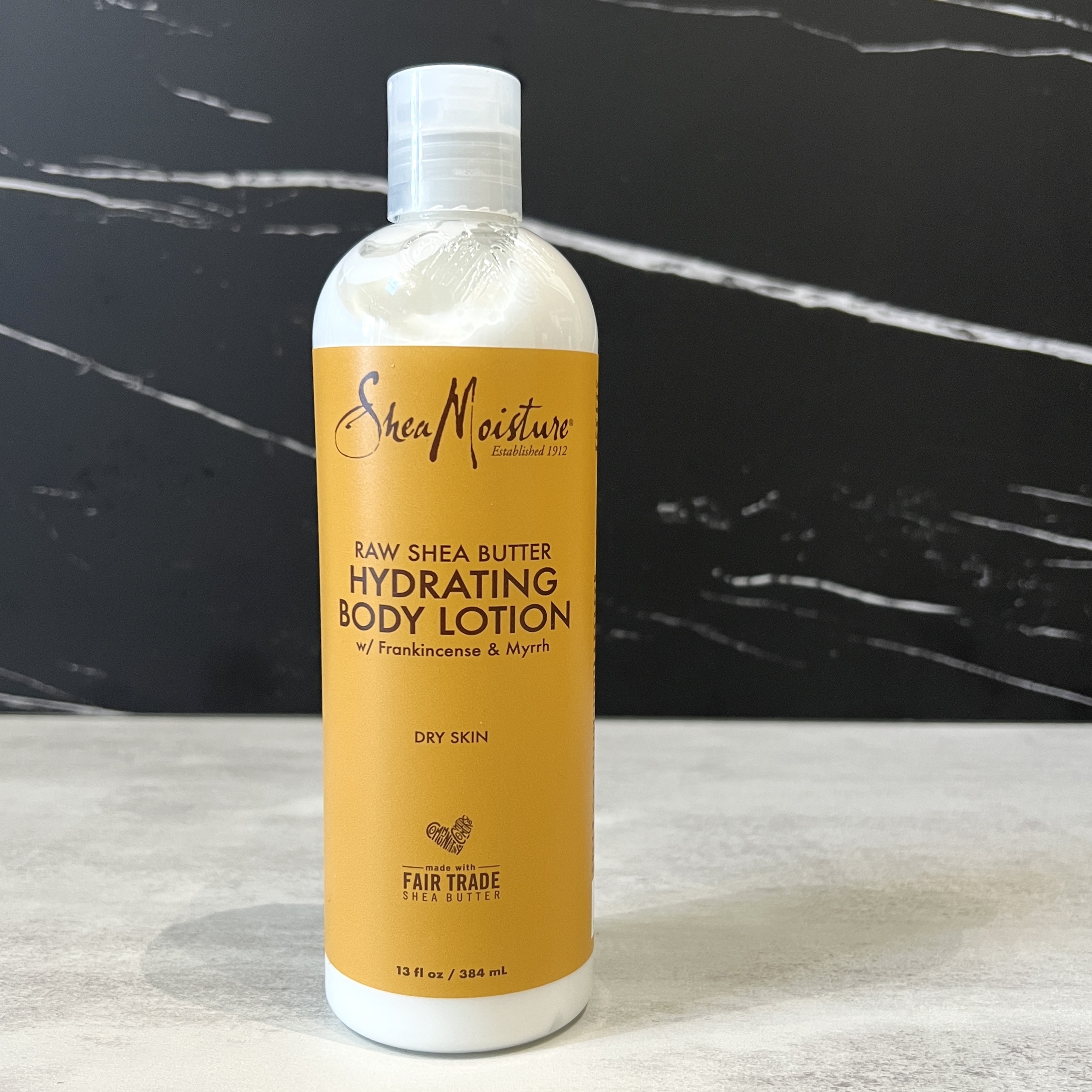 Front of Shea Moisture Body Lotion for Cocotique October 2023