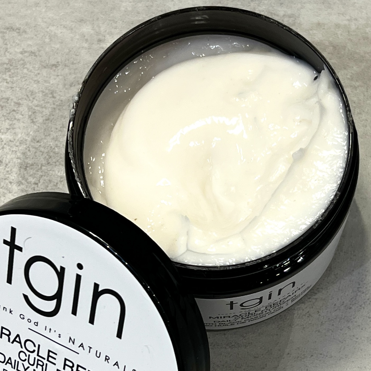 Open Shot of TGIN Miracle RepaiRX Curl Food for Cocotique December 2023