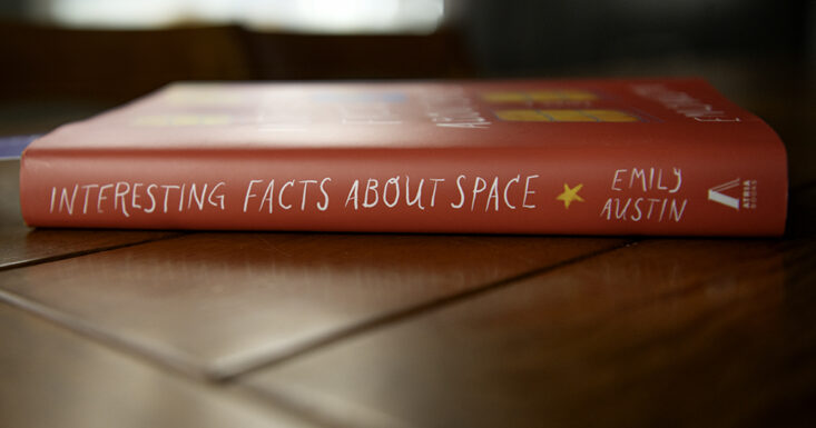 January 2024 Book of the Month club book Interesting Facts About Space sits on a table. 