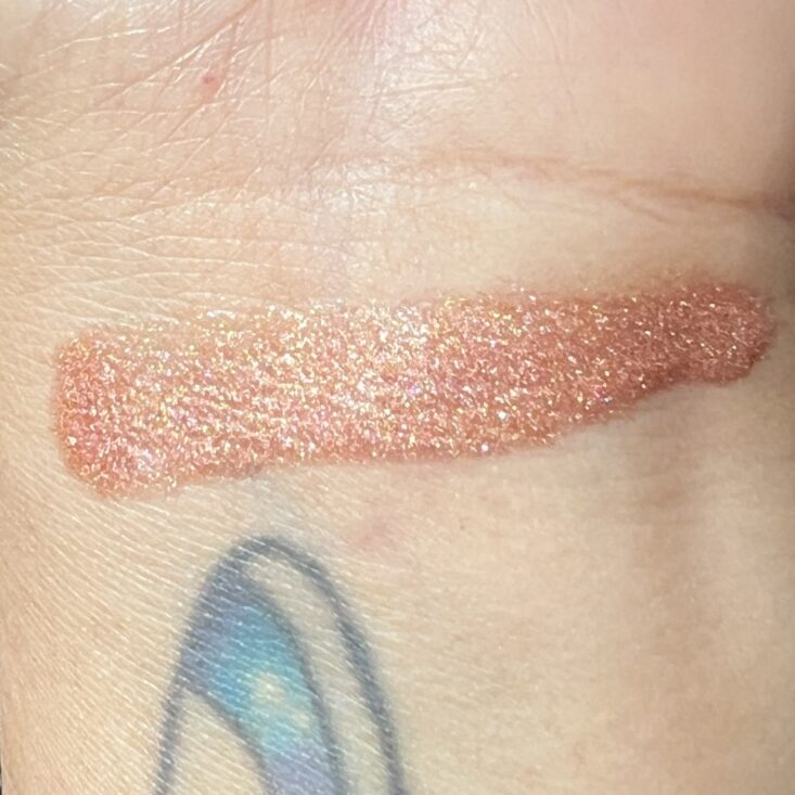 Swatch of Ofra Cosmetics Lip Gloss in Blissful for Ipsy Glam Bag March 2024