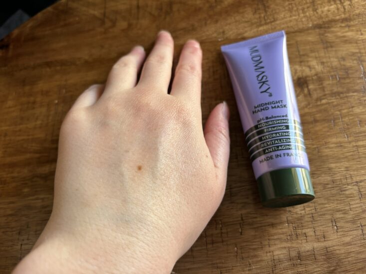 Mudmasky hand cream applied to a hand