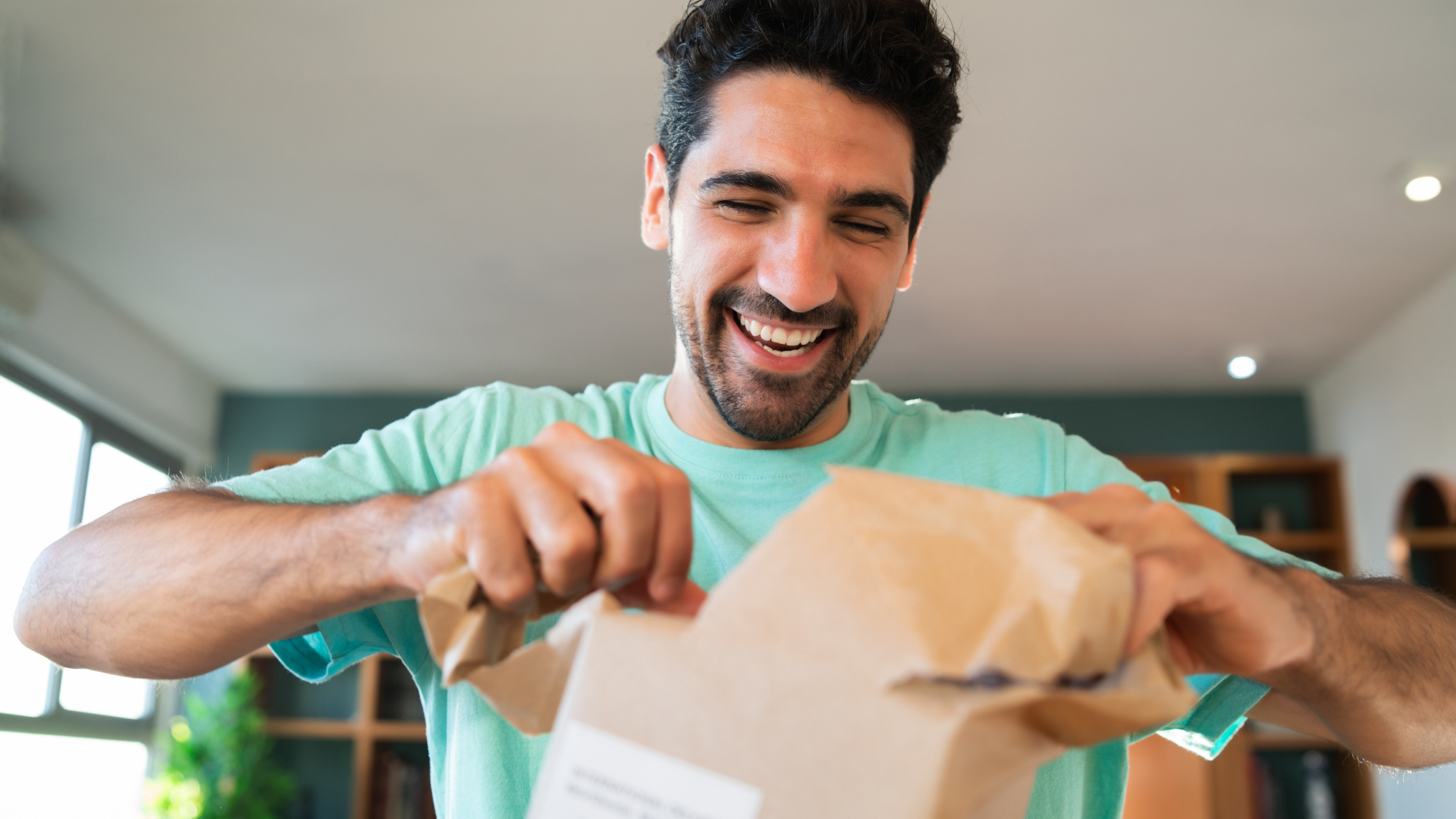 Surprised Man Opening a Gift Box.