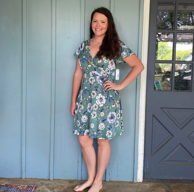 Brandi Dowell showcasing her new Kaela Faux Wrap Knit Dress from her Stitch Fix clothing box.