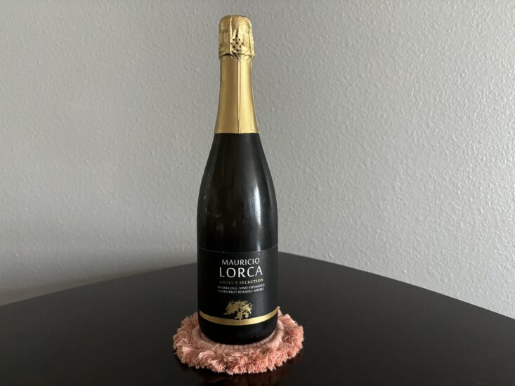 bottle of rose sparkling wine on table