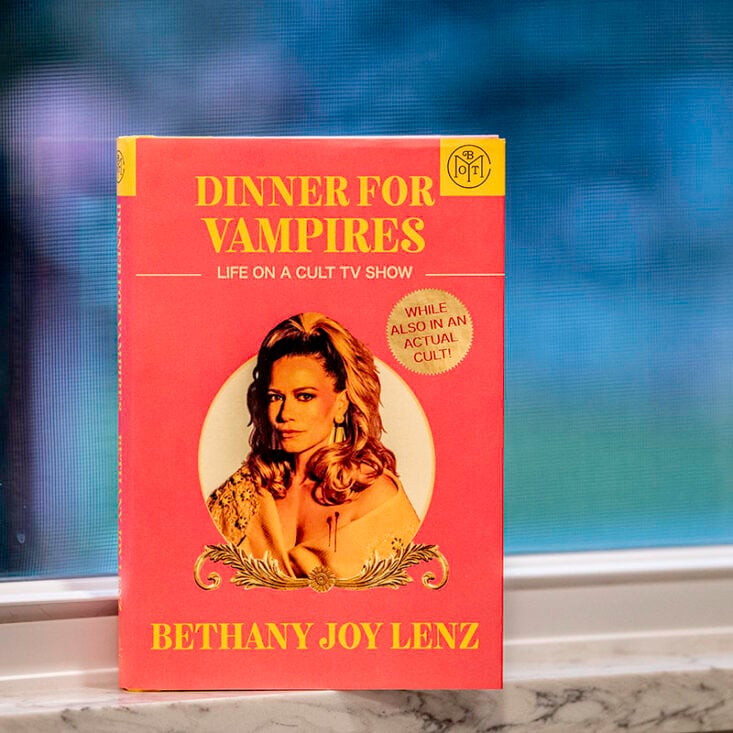 Dinner for Vampires by Bethany Joy Lenz sits on a window sill