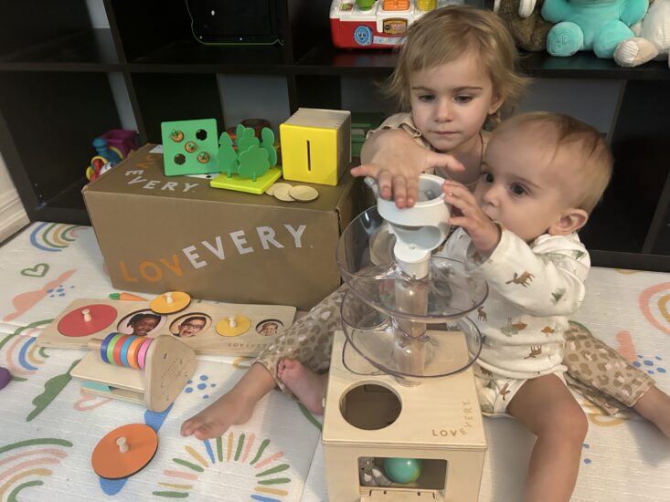 young girl and boy playing with lovevery toys