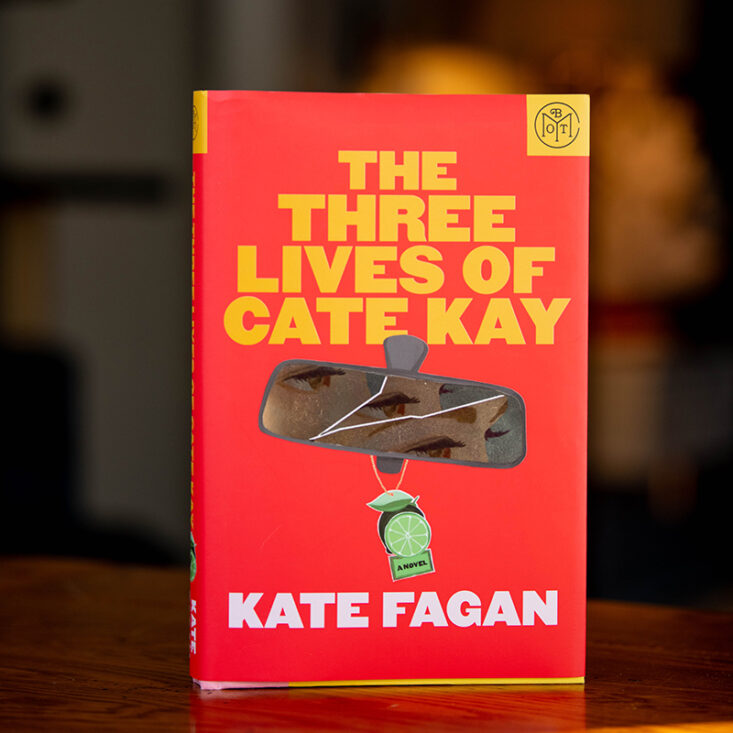 The Three Lives of Cate Kay book with a Book of the Month logo in the corner