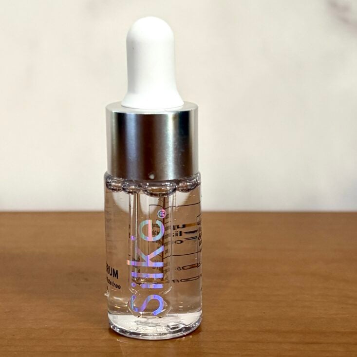 Front of SLEEK'E Silk'e Hair Serum for Ipsy Glam Bag July 2025