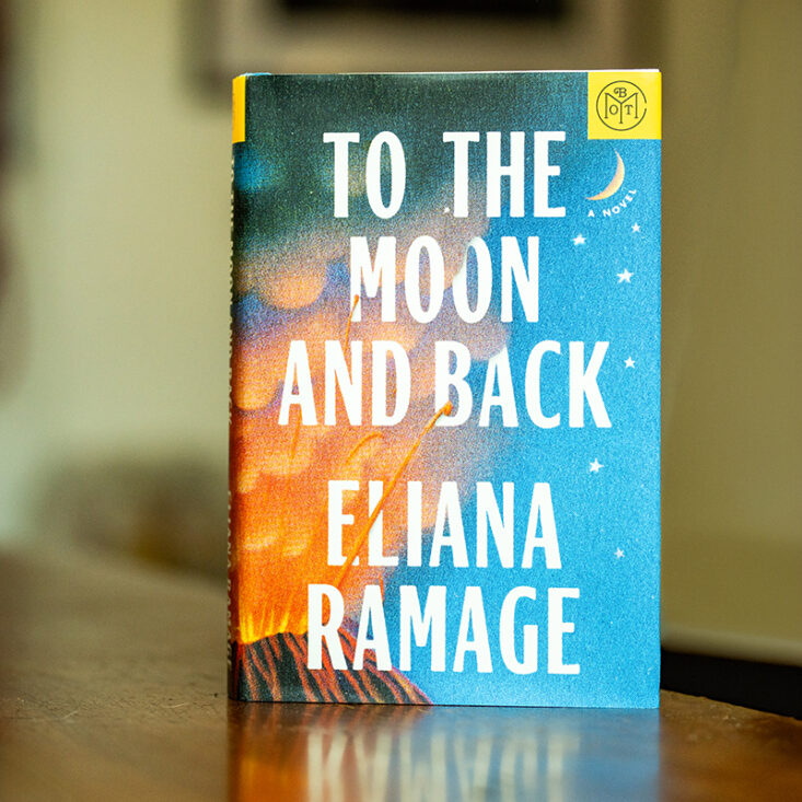 To the Moon and Back book stands on top of desk