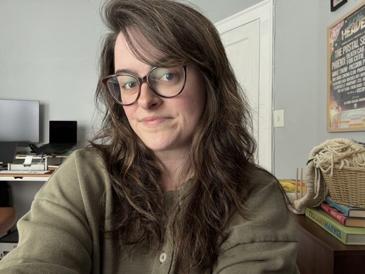 Person with wavy hair after using ColorWow Color Security Shampoo