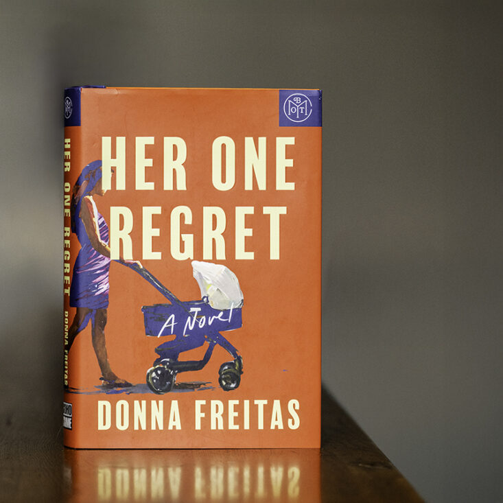 Book of the Month Club book her One Regret sitting on shelf