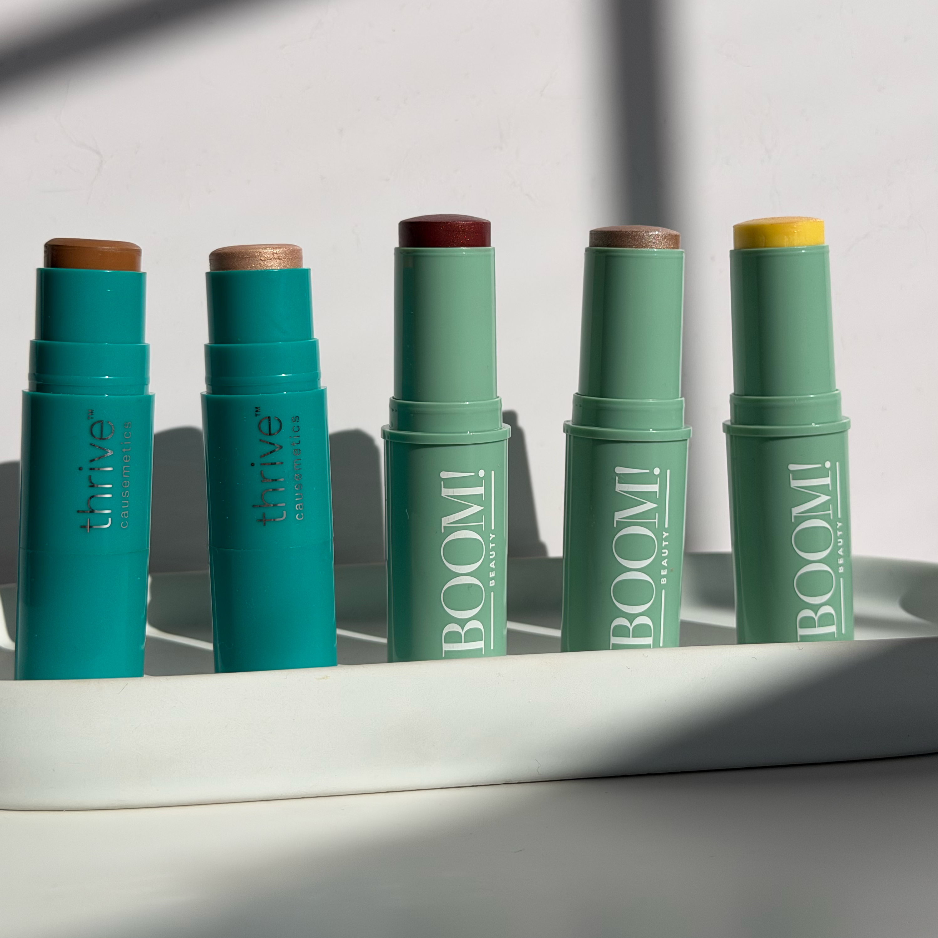 The Boomstick Trio vs. Thrive Triple Threat Color Stick: The Makeup Upgrade You’ll Want To Use Every Day