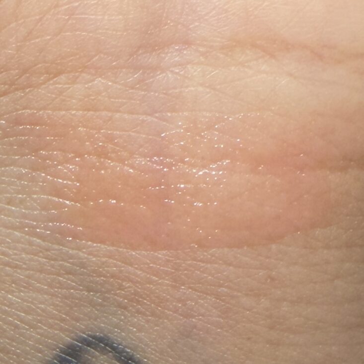 Swatch of Tarte Juicy Lip for IPSY Original December 2025