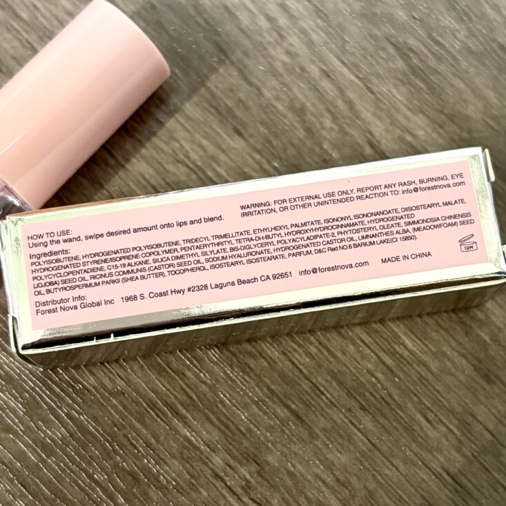 Back of TYNT Beauty Glossy Lip Oil for Ipsy Original May 2026