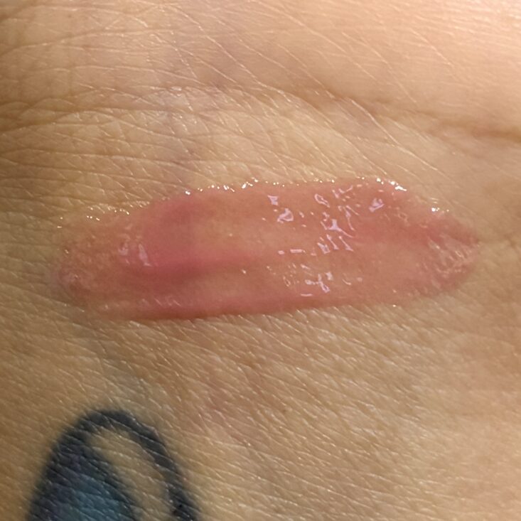 Swatch of Hola Neon Lip Oil for IPSY Original August 2026